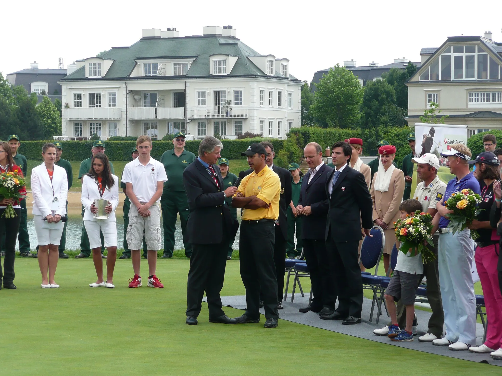 Photo showing: The winner Jeev Milkha Singh being asked about his play at the award ceremony 2008 Bank Austria GolfOpen presented by Telekom Austria (European Tour) at Golfclub Fontana.