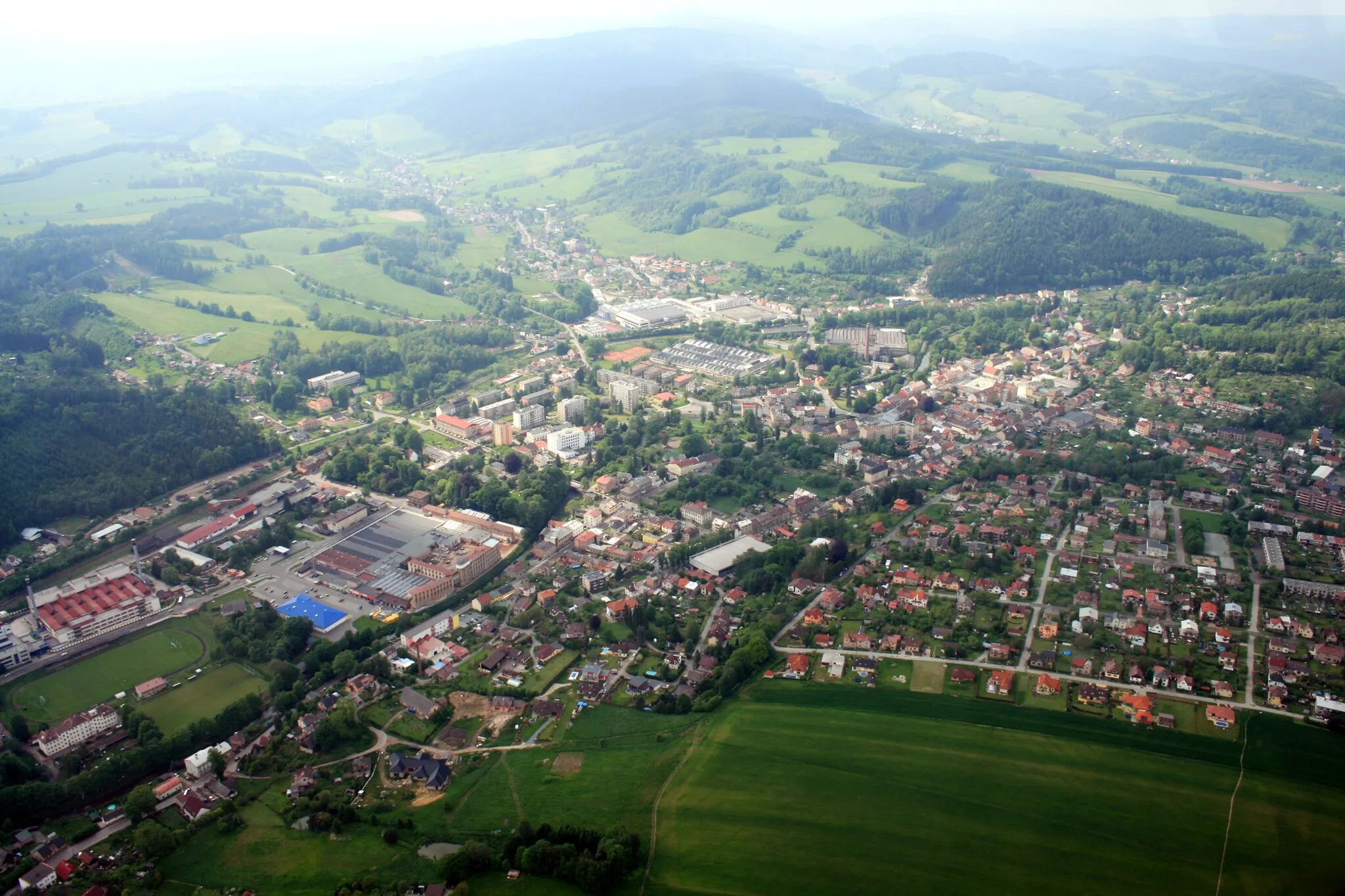 Photo showing: Town Hronov and village Zbečník from air, eastern Bohemia, Czech Republic