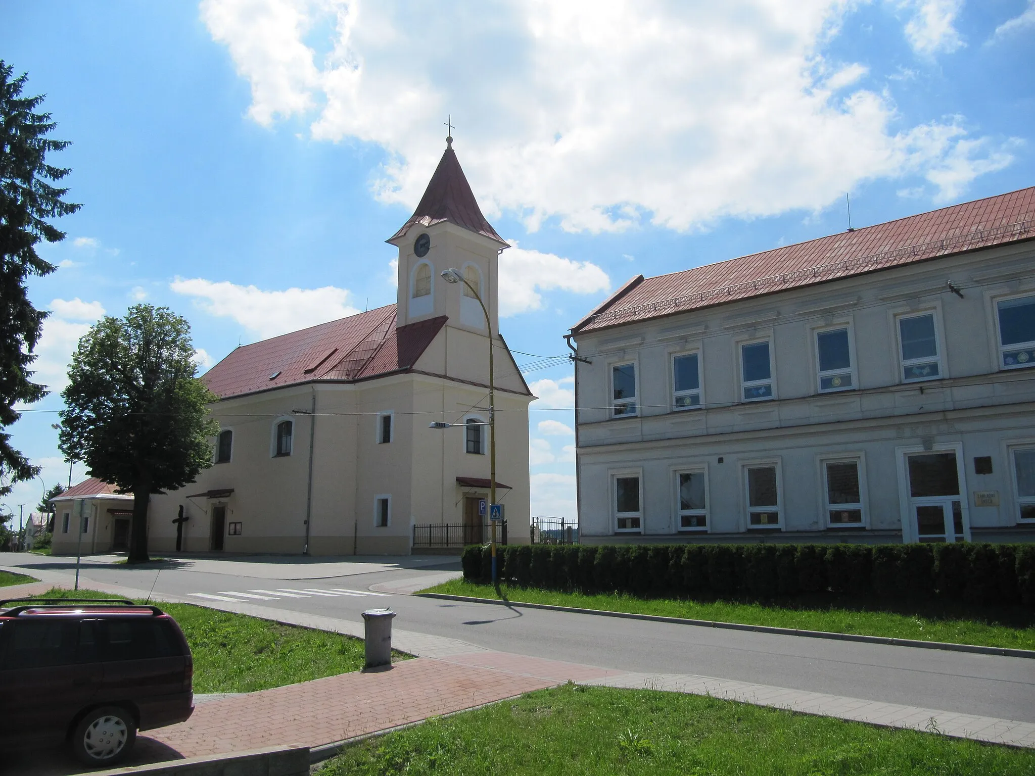 Photo showing: Halenkovice in Zlín District, Czech Republic.St.-Joseph-church and the old school.