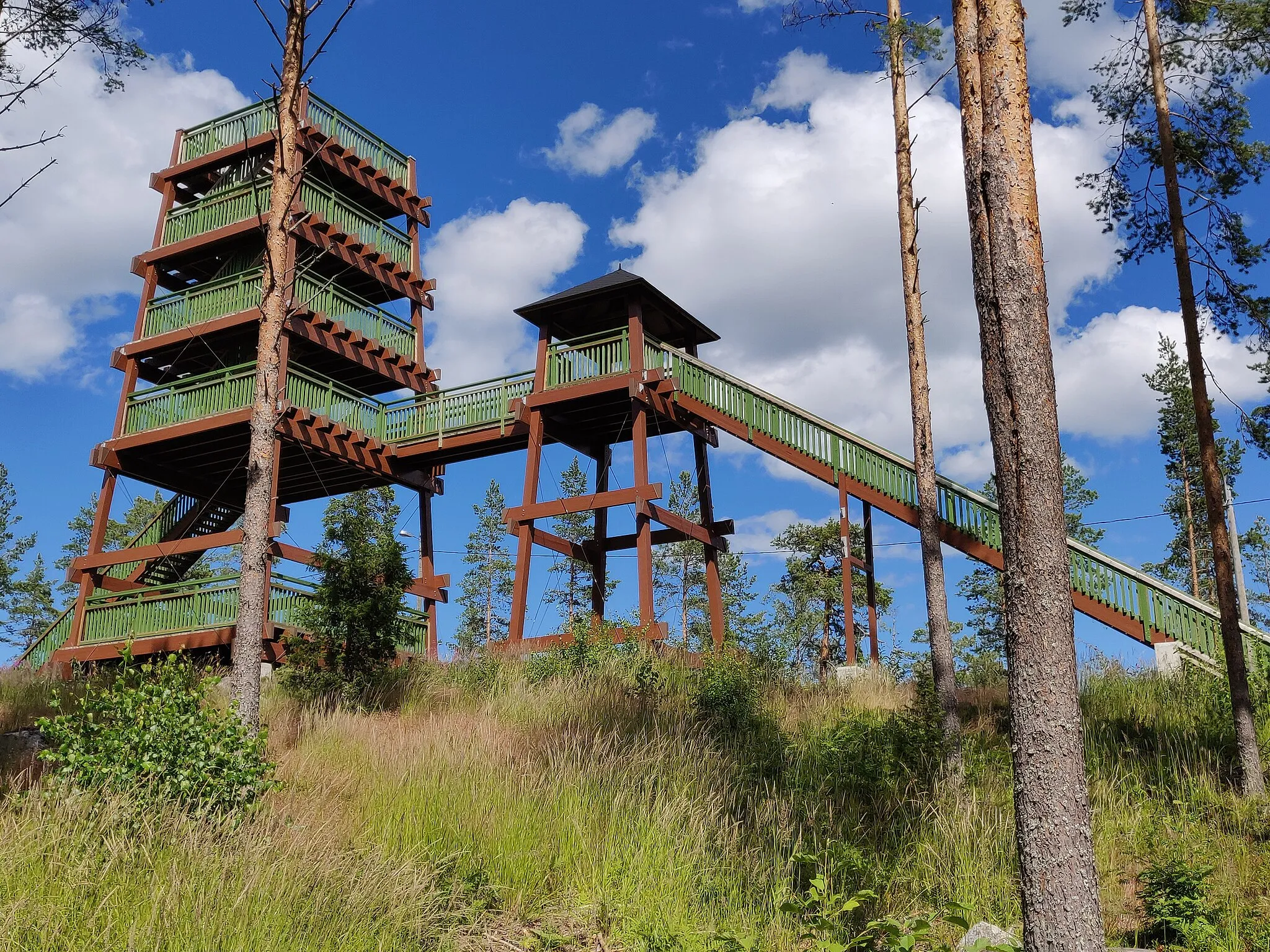 Photo showing: Two wooden observation towers on a hill.