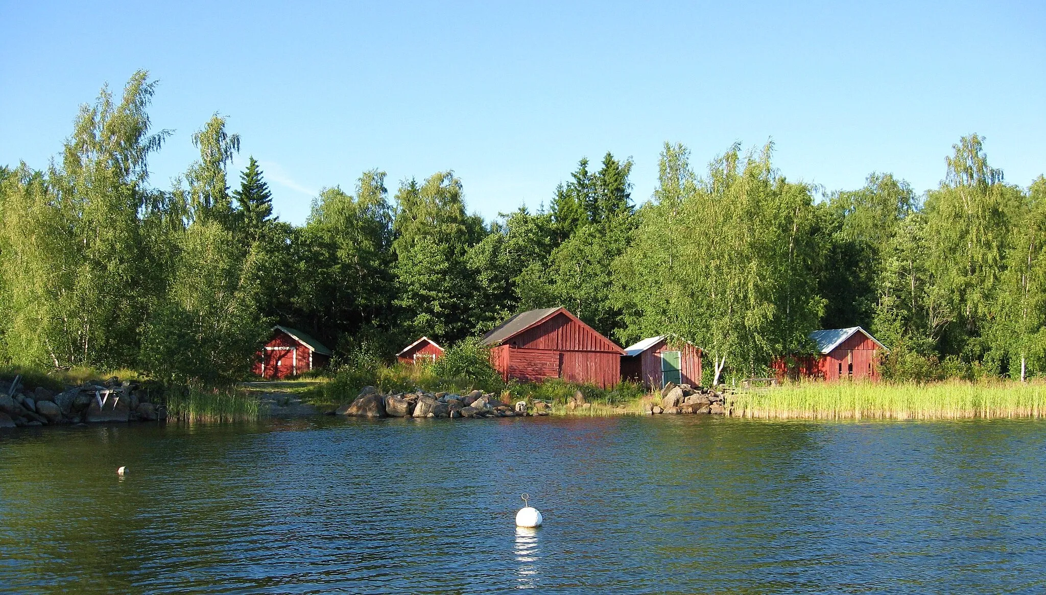 Photo showing: Boathouses at a distance in Grönvik village of Korsholm, Finland.