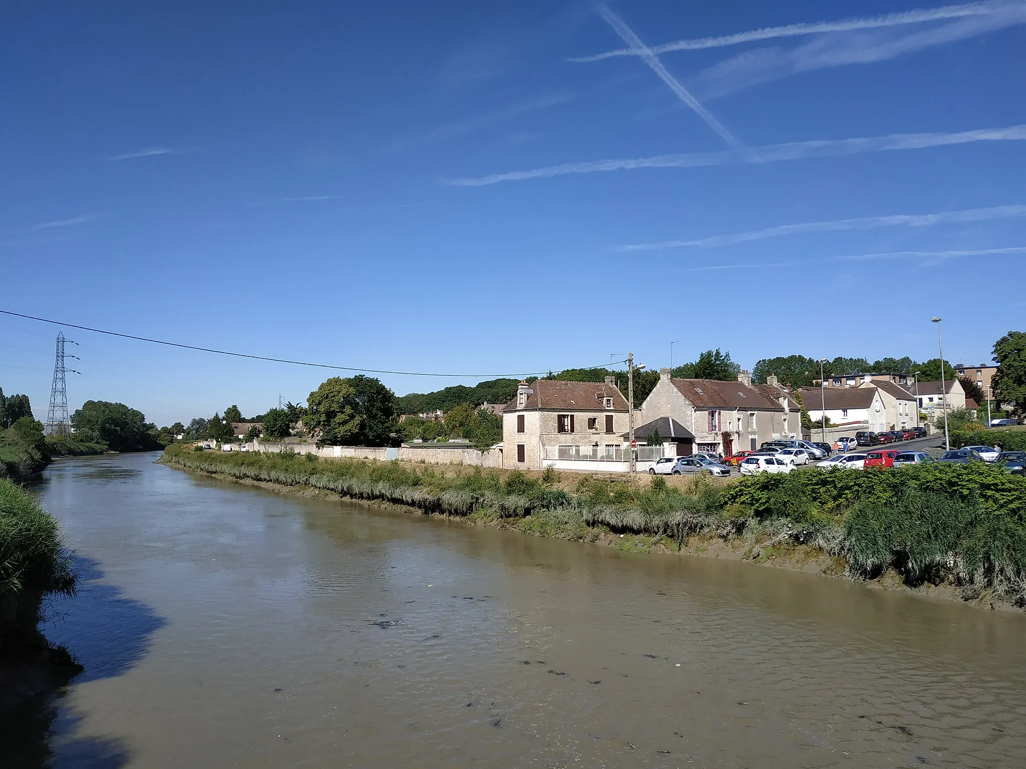 Photo showing: vieux village de Colombelles depuis le pont sur l'Orne