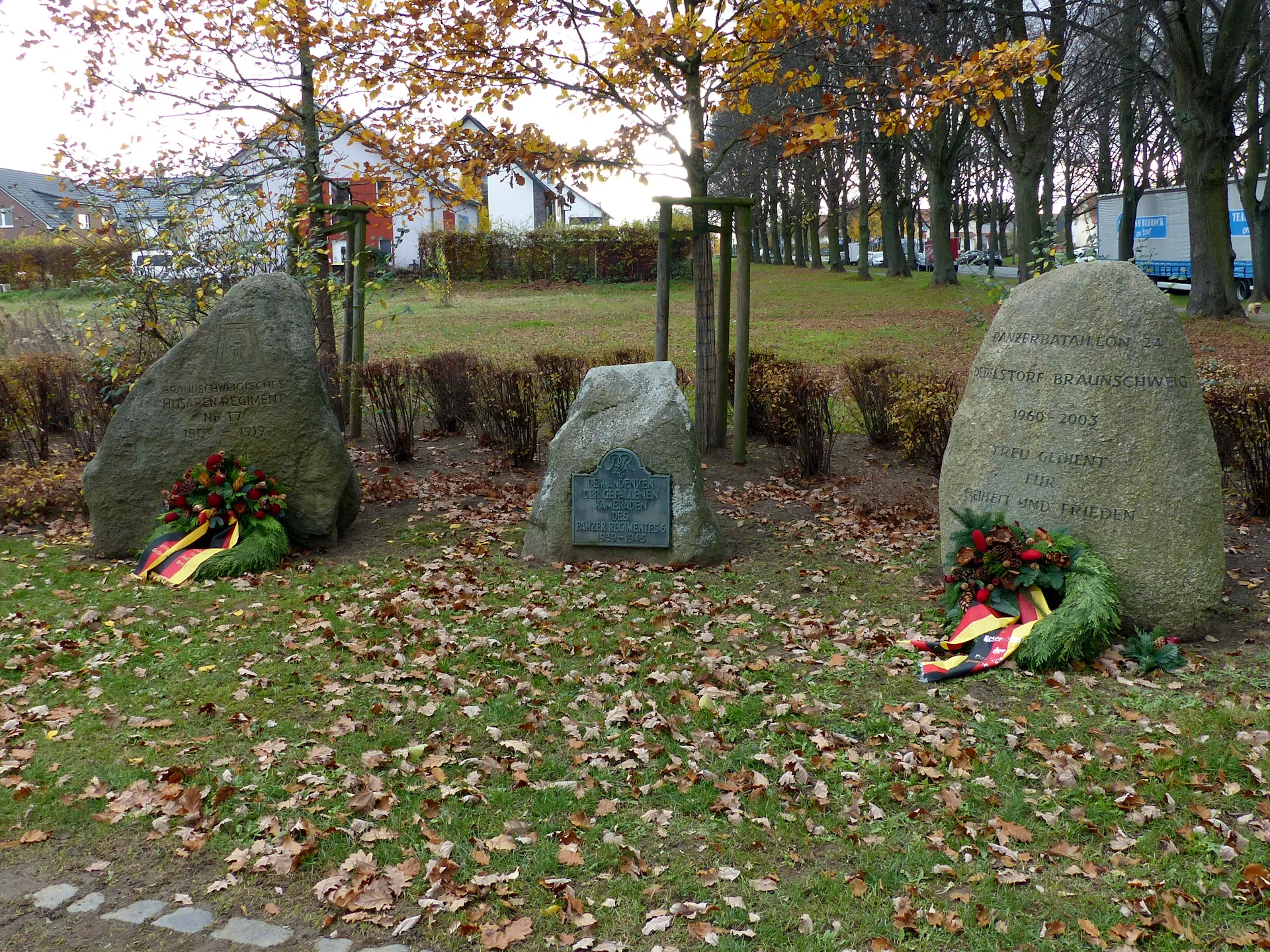 Photo showing: Group of ten memorial stones from several epochs of the garrison town - here three stones of the middle.