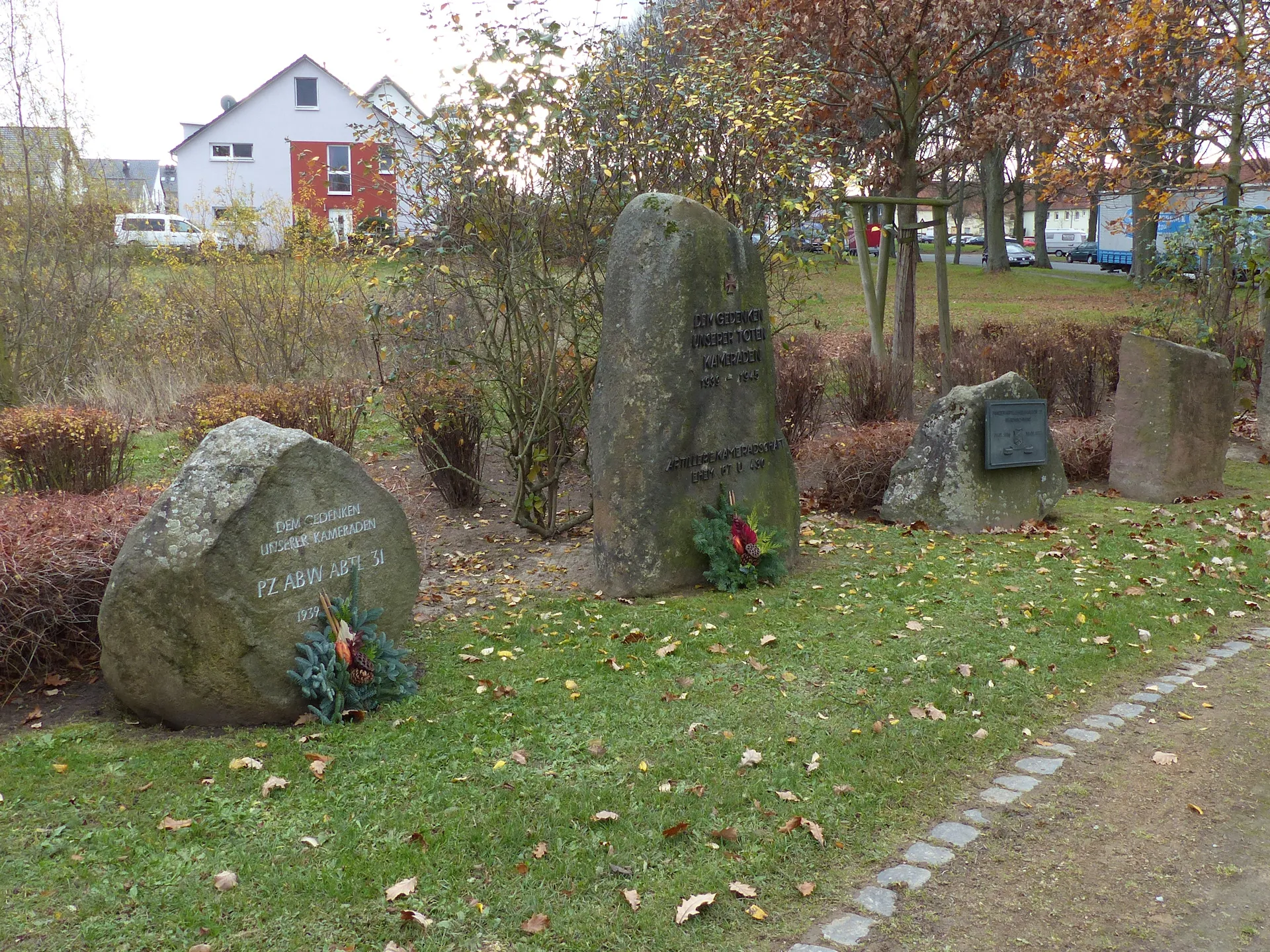 Photo showing: Group of ten memorial stones from several epochs of the garrison town - here four stones of the most left side.