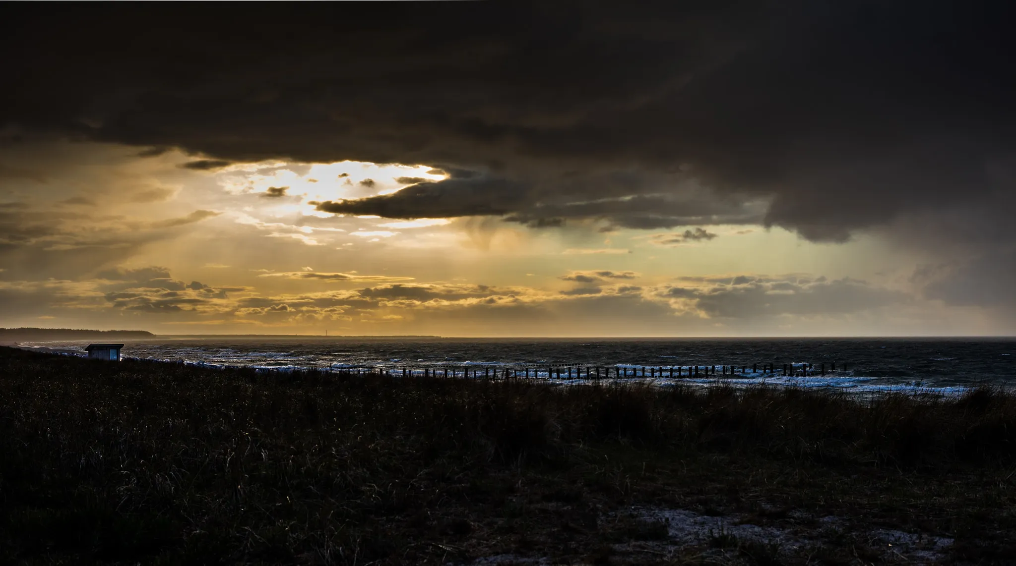 Photo showing: 500px provided description: Scary view to the horizont. [#yellow ,#sky ,#landscape ,#sea ,#sunset ,#water ,#beach ,#clouds ,#waves ,#orange ,#dark ,#germany ,#sundown ,#heaven ,#dramatic ,#scary ,#himmel ,#zingst ,#dar? ,#Landschaft ,#Shot]