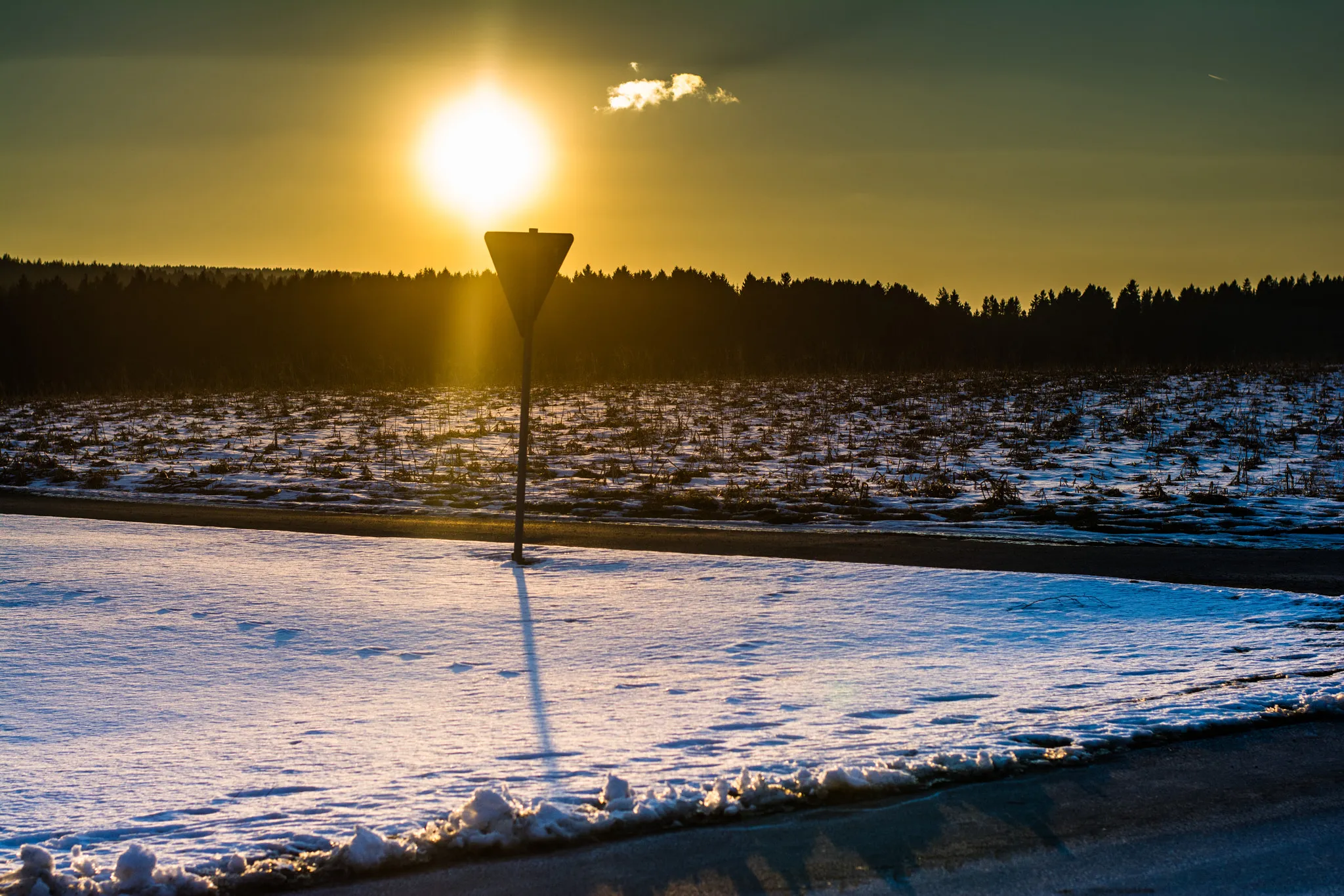 Photo showing: 500px provided description: Shooting out of the driving bus. [#field ,#sky ,#forest ,#winter ,#street ,#cold ,#sun ,#clouds ,#road ,#bright ,#golden ,#grass ,#nikon ,#snow ,#evening ,#50mm ,#warm ,#germany ,#sign ,#shine ,#traffic sign ,#backlight ,#bavaria ,#golden hour ,#franconia]