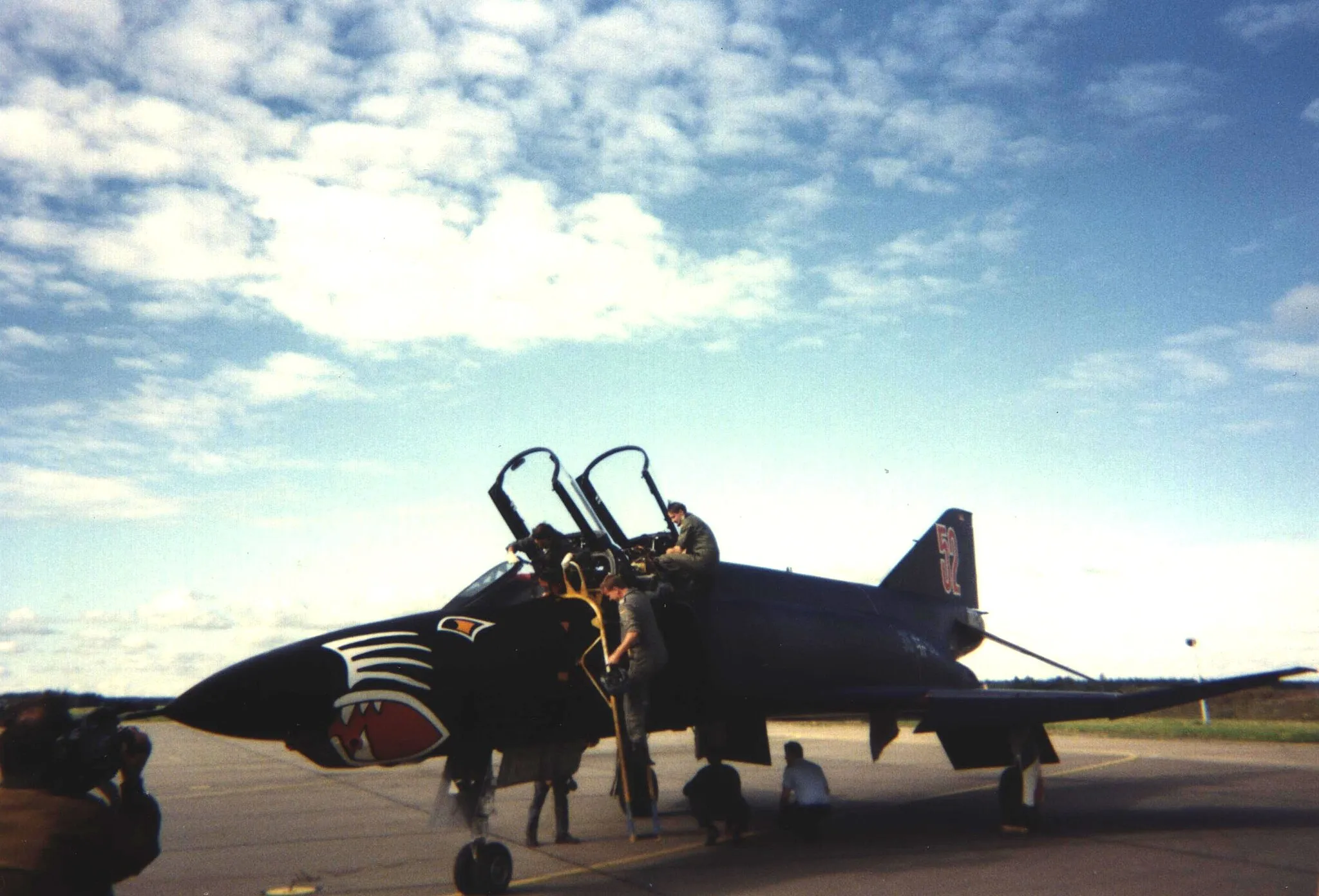 Photo showing: A German Luftwaffe McDonnell Douglas RF-4E Phantom II (s/n 35+52) from Aufklärungsgeschwader 52 (52nd Reconnaissance Wing) after having made the last landing before decommissioning of the wing at Leck air base.