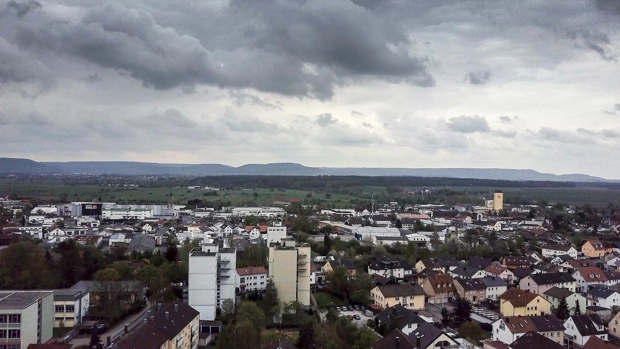 Photo showing: View of the industrial part of the German town of Hassfurt from north. The landmarks, typical for the town, are not on the picture. Drone photo from ~ 40 meter elevation.