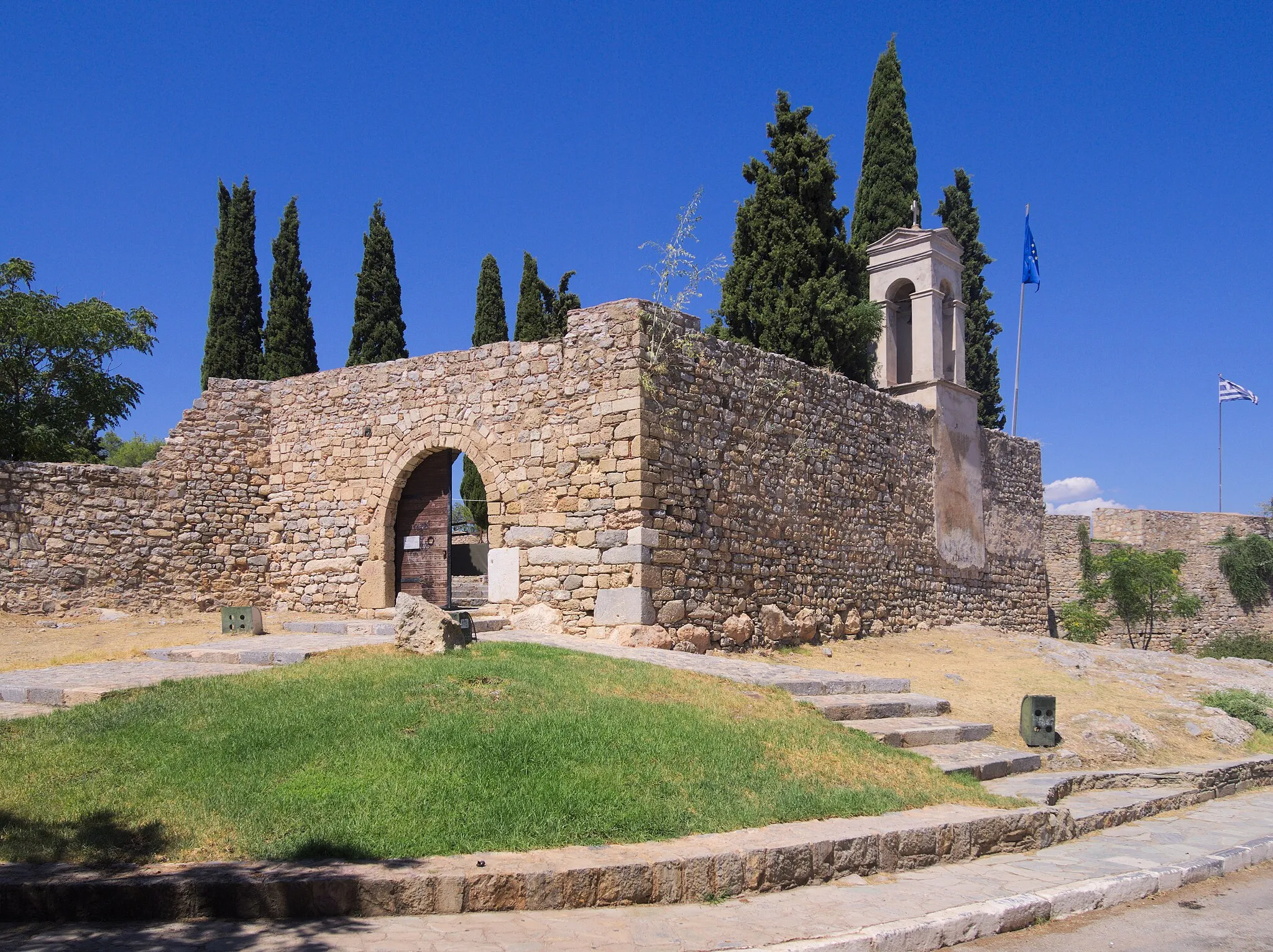 Photo showing: The entrance of Karababas castle, with bell tower visible to the right. A flag pole was removed with GIMP.