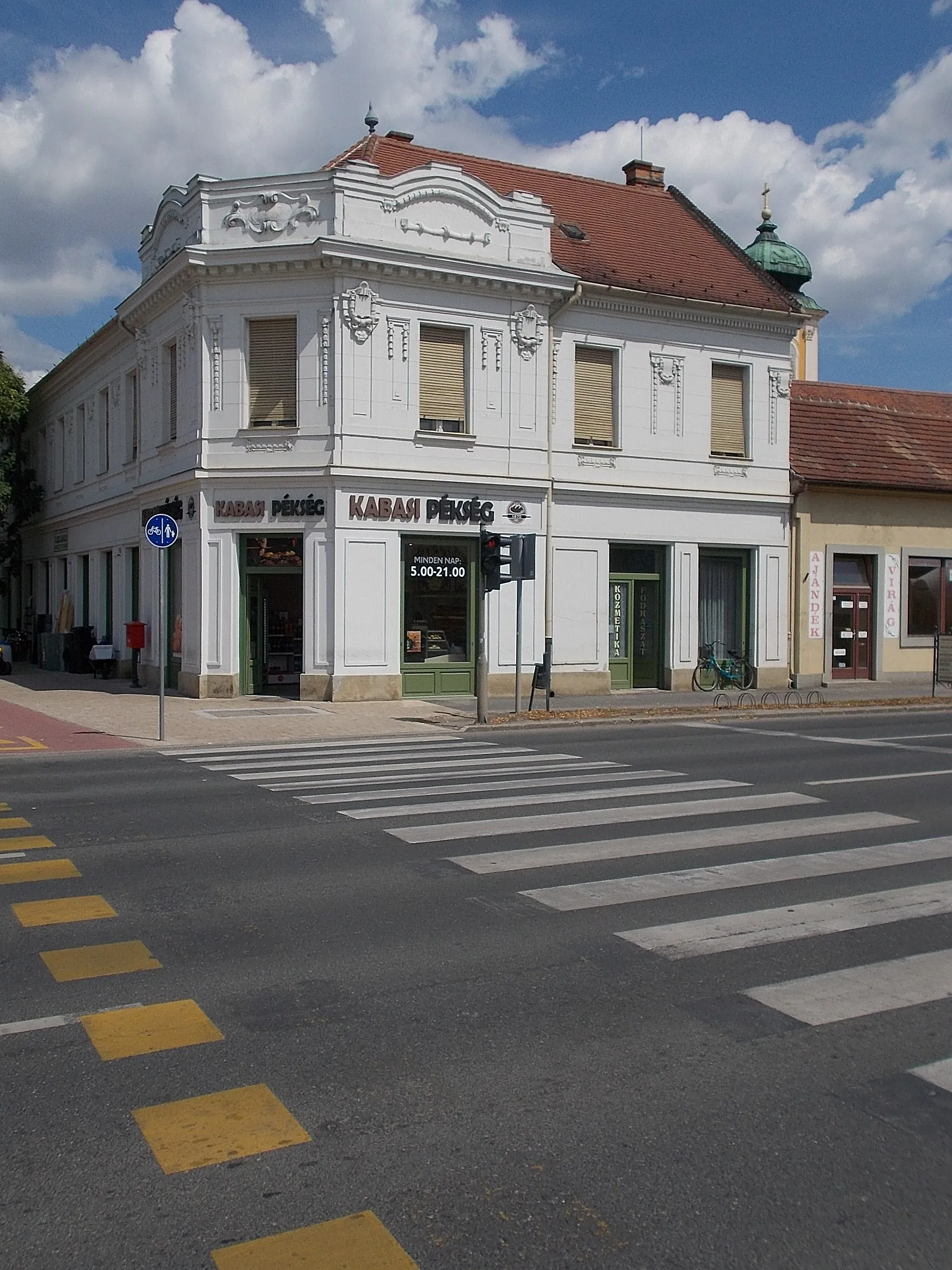 Photo showing: : Corner building with bakery -  Soproni út (Road 85 and Road 86) corner, Downtown, Csorna, Győr-Moson-Sopron County, Hungary