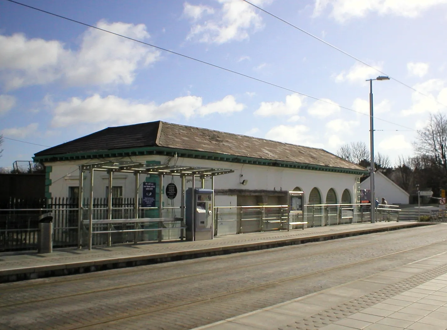 Photo showing: The original Dundrum station built by William Dargan in 1854 behind the modern Luas halt