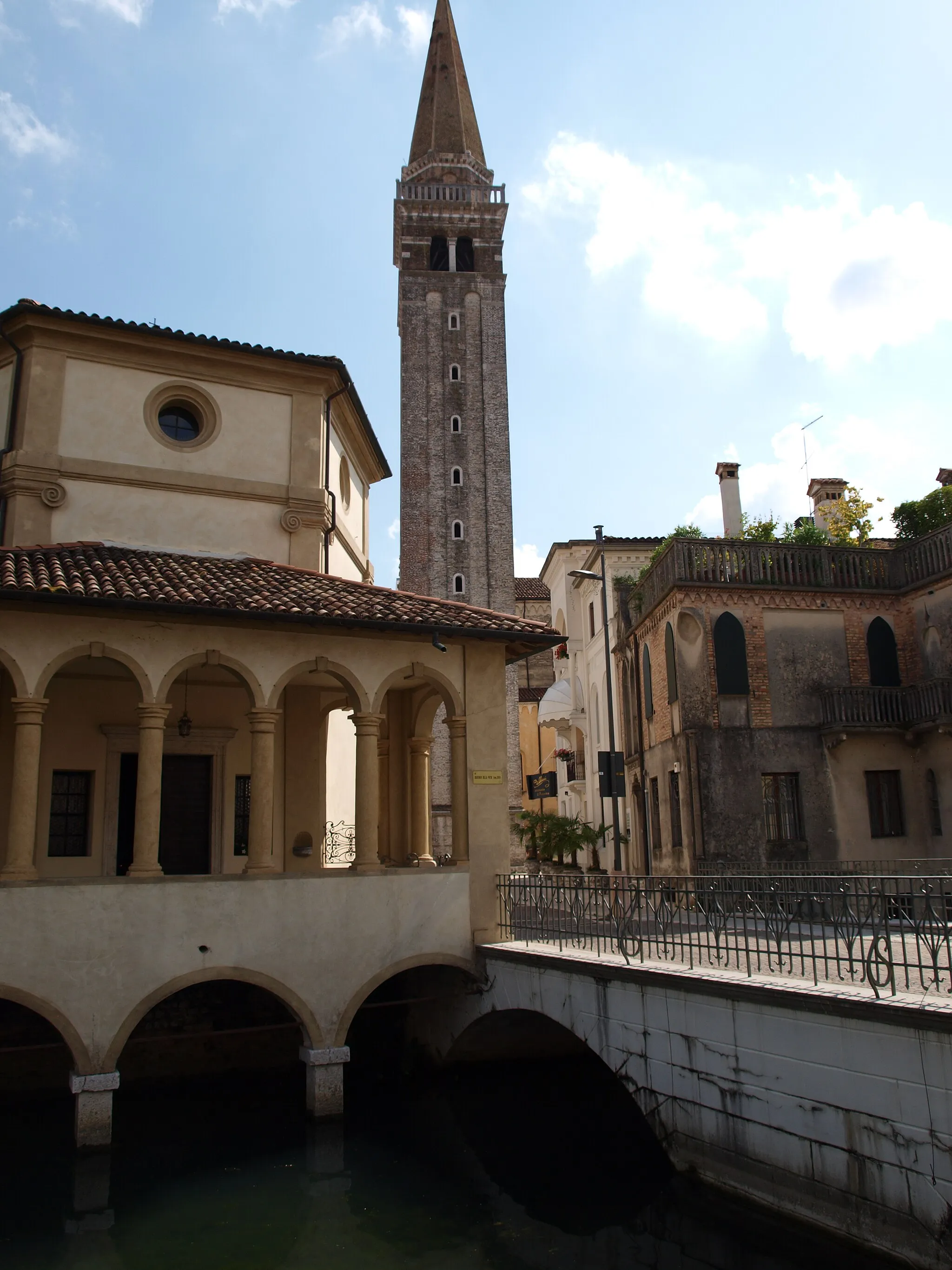 Photo showing: Bell tower of the Duomo and the chiesa di Santa Maria della Pietà in Sacile (Saint Mary of Mercy church), in Northeast Italy.