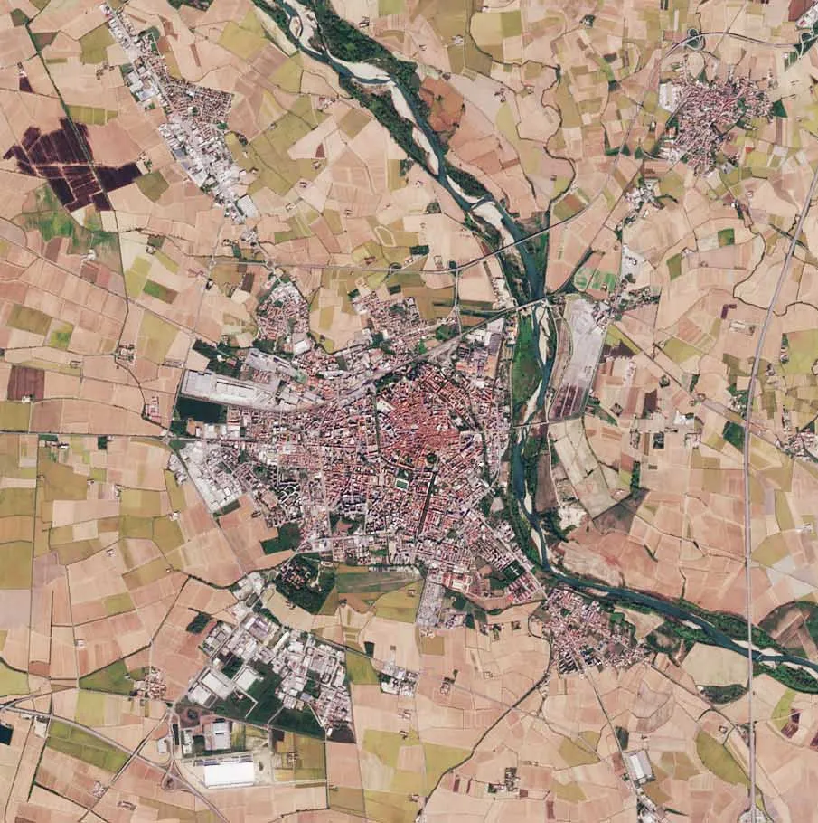 Photo showing: The Copernicus Sentinel-2B satellite takes us over the Italian Alps and down to the low plains that surround the city of Milan.
The image captures the transition between the high snow-capped peaks of the Italian Alps and the flatlands of the northwest Po Valley. This transition cuts a sharp diagonal across the image, with the mountains in the top left triangle and the flat low-lying land in the bottom right.
The southern part of the beautiful Lake Maggiore can also be seen in the image. Although its northern end crosses into Switzerland, Lake Maggiore is Italy’s longest lake and its character changes accordingly. The upper end is completely alpine in nature and the water is cool and clear, the middle region is milder lying between gentle hills and Mediterranean flora, and the lower end advances to the verge of the plain of Lombardy.
The River Ticino, which rises in Switzerland and flows through Lake Maggiore, can be seen emerging from the lake’s southern tip. Here, the land, which is one of the most fertile regions in Italy, gives way to numerous agricultural fields, which are clearly visible to the west of the river. The city of Milan lies to the east of the river.
In May 2019, Milan will host ESA’s Living Planet Symposium. Held every three years, these symposia draw thousands of scientists and data users from around the world to discuss their latest findings on the environment and climate.
This image, which was captured on 9 October 2017, is also featured on the Earth from Space video programme.

contains modified Copernicus Sentinel data (2017), processed by ESA, CC BY-SA 3.0 IGO