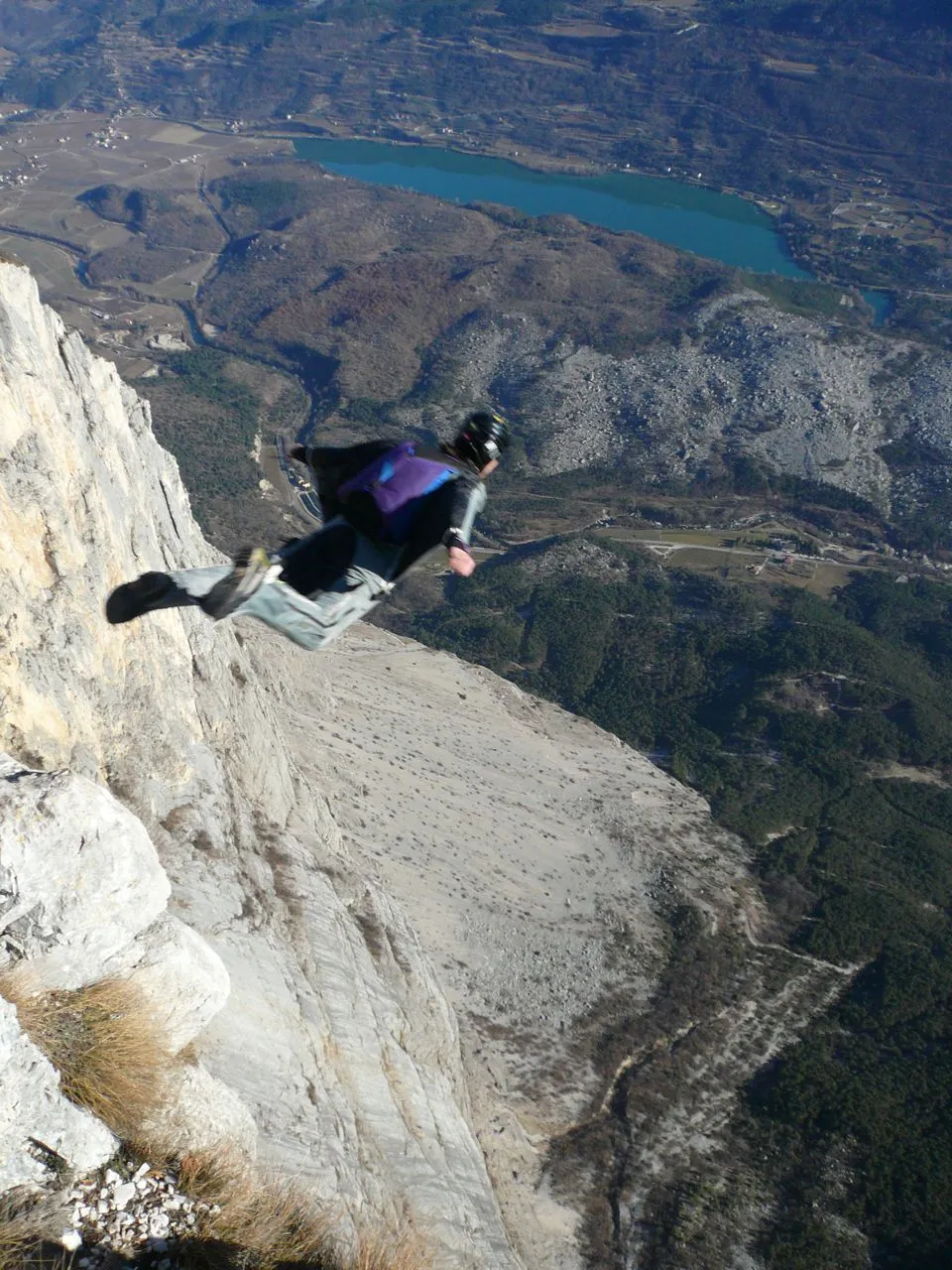 Photo showing: Steph Davis performing a BASE jump in a wingsuit
