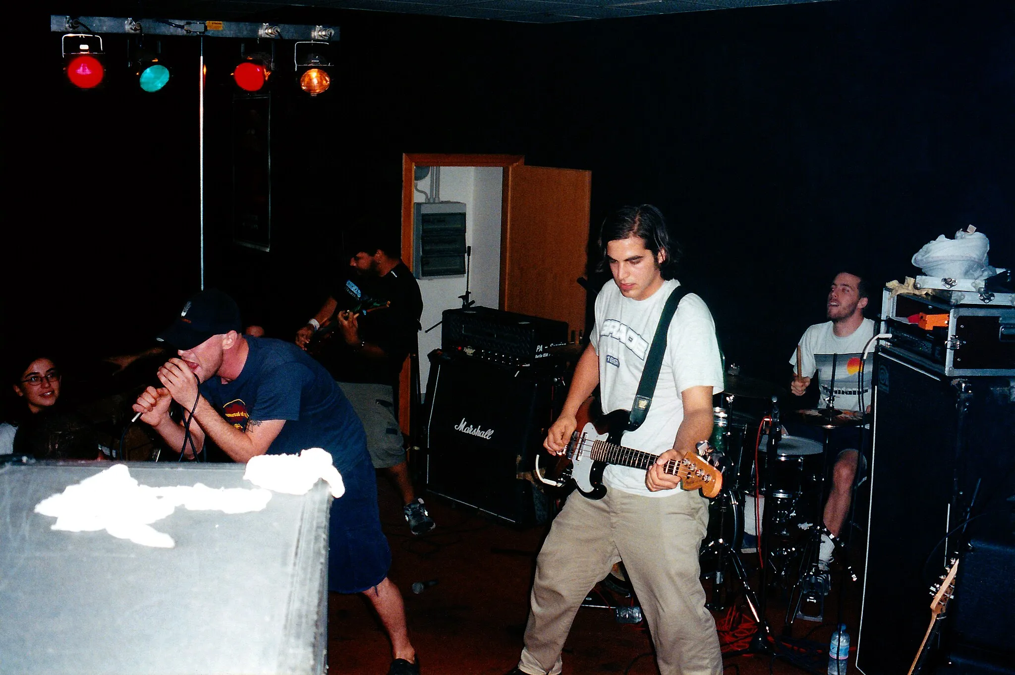 Photo showing: American melodic hardcore band As Friends Rust performing at Plan 9 in Limena, Italy on September 16, 2000. From left to right: Kaleb Stewart, Joseph Simmons, Peter Bartsocas and Timothy Kirkpatrick.