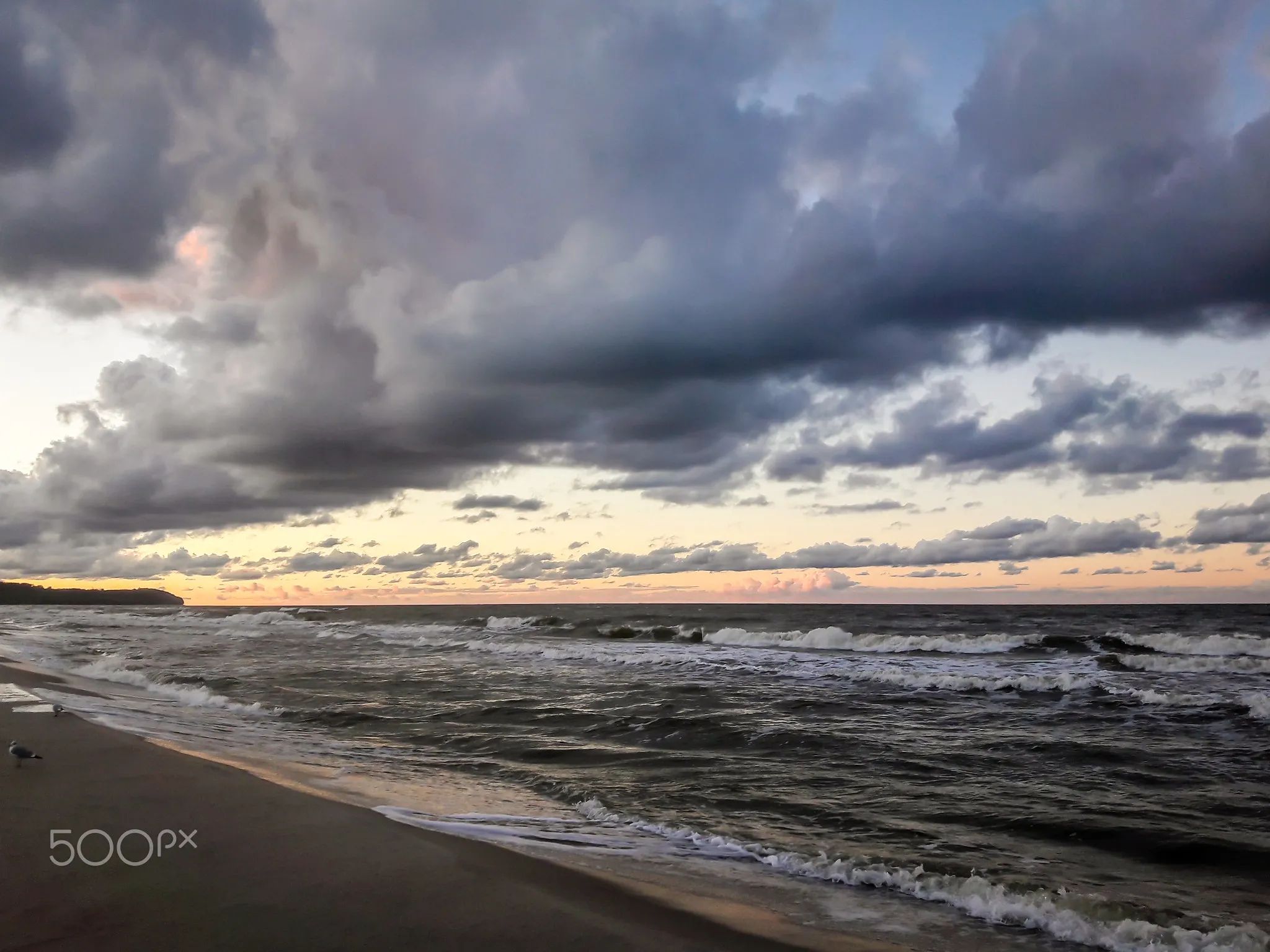 Photo showing: 500px provided description: 47 [#landscape ,#sea ,#sunset ,#water ,#wind ,#clouds ,#waves ,#sand ,#seascape ,#seagull ,#seashore]