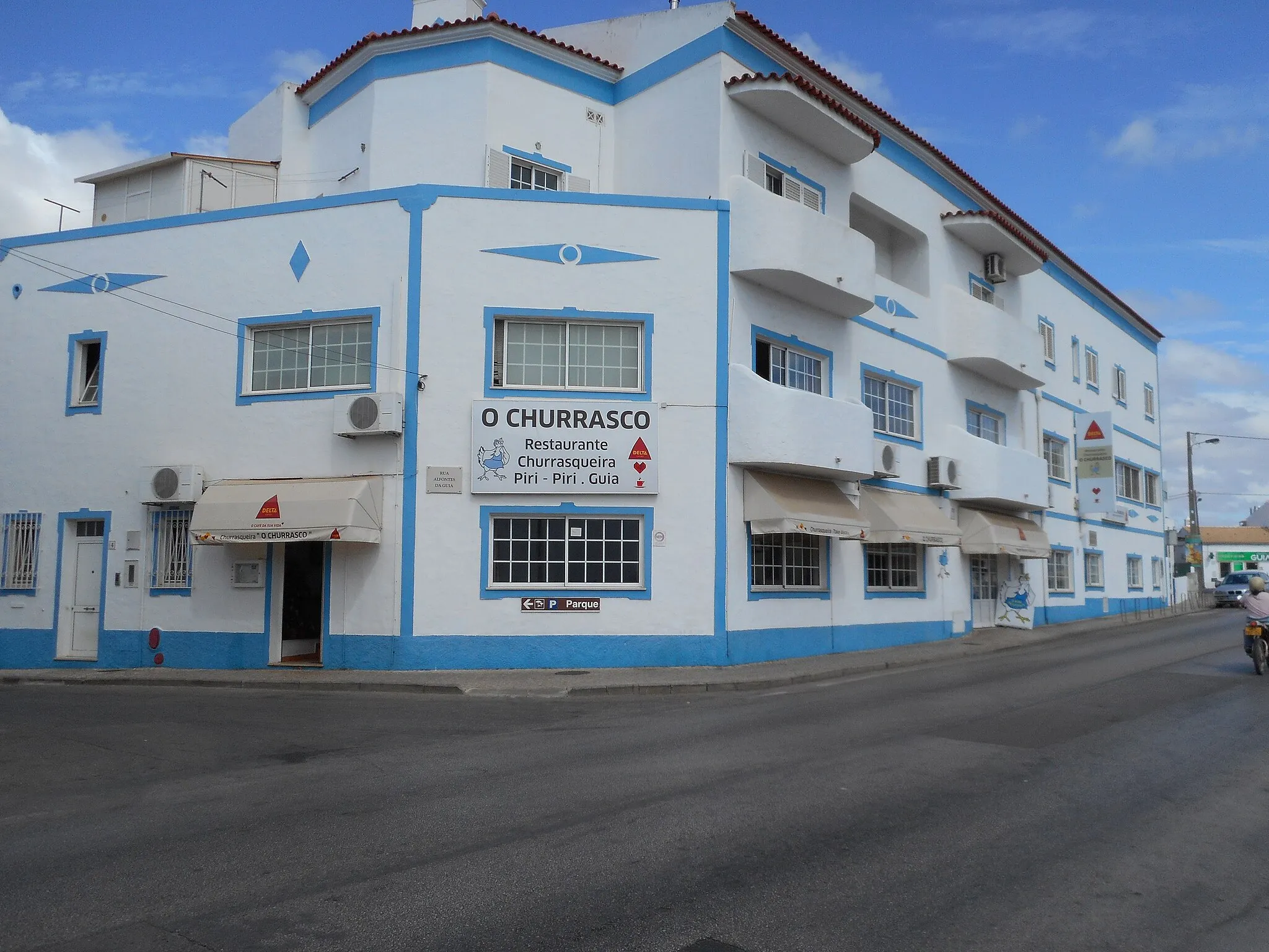 Photo showing: O Churrascothe Restaurante in the Rua General Humberto Delgado within the town of Guia, Algarve, Portugal.