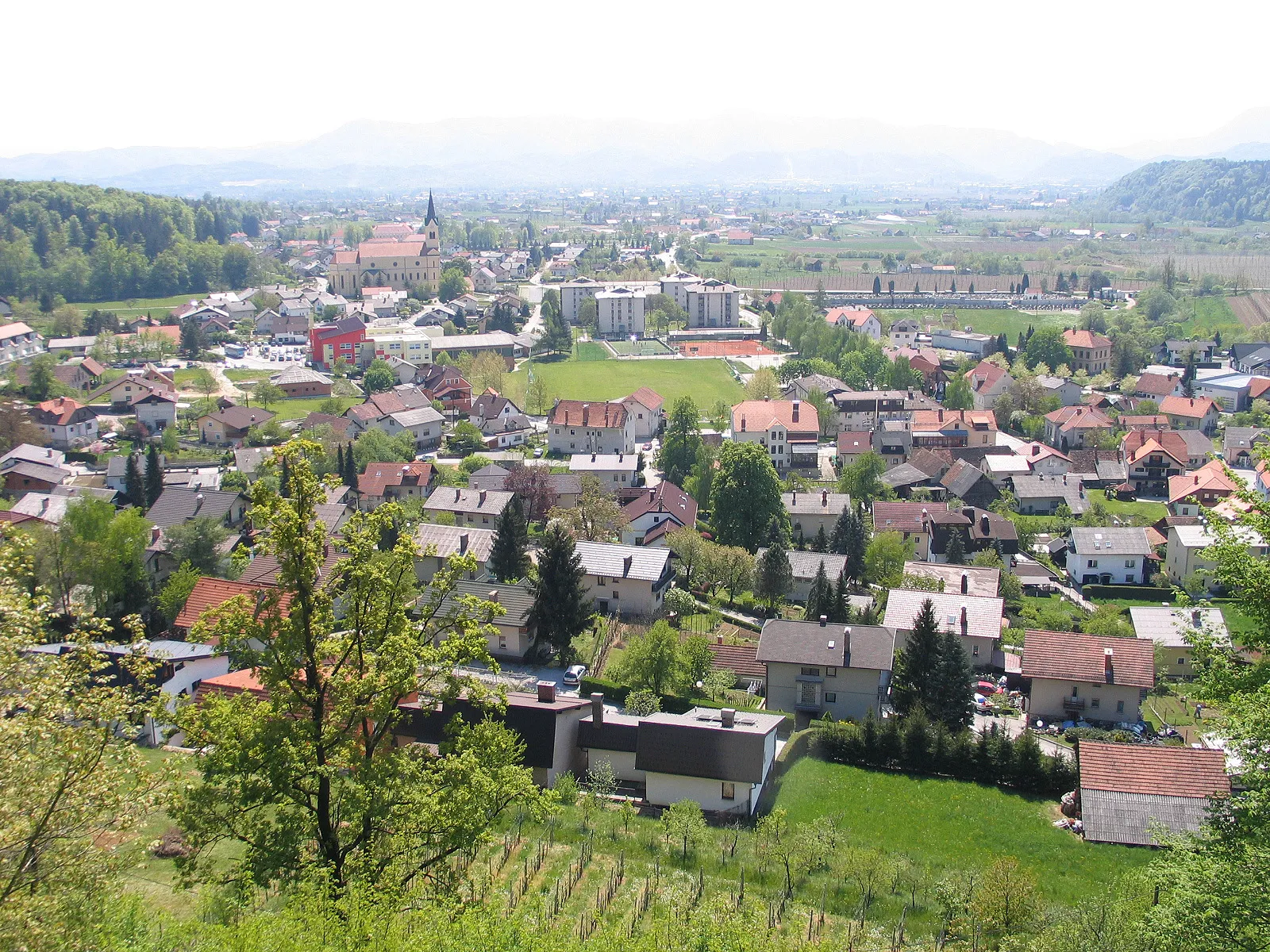 Photo showing: Vojnik, a view towards the south. The city in the distance is Celje.