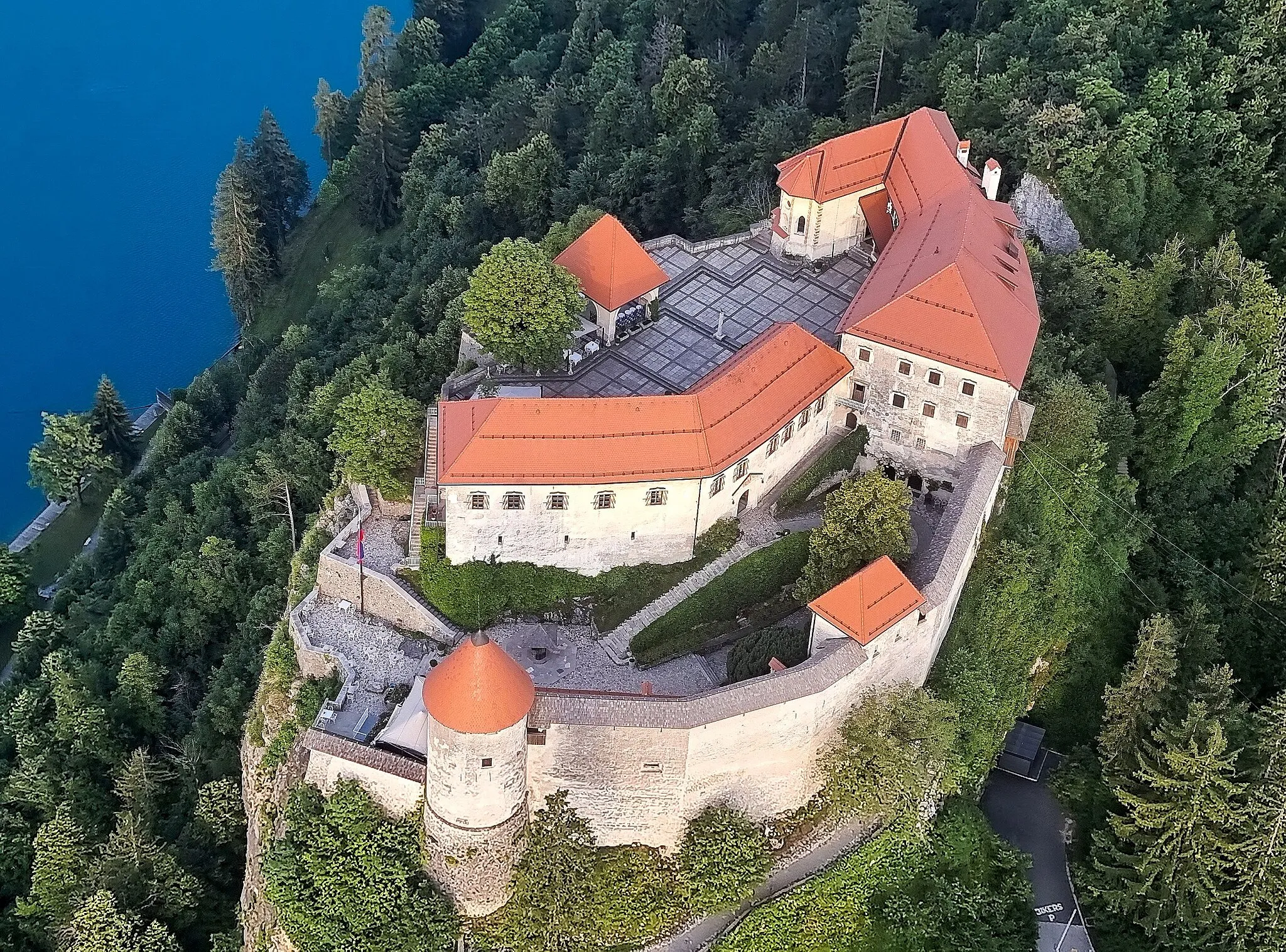 Photo showing: Photo of the Bled Castle from a hot-air balloon on 8 July 2023 in the morning.