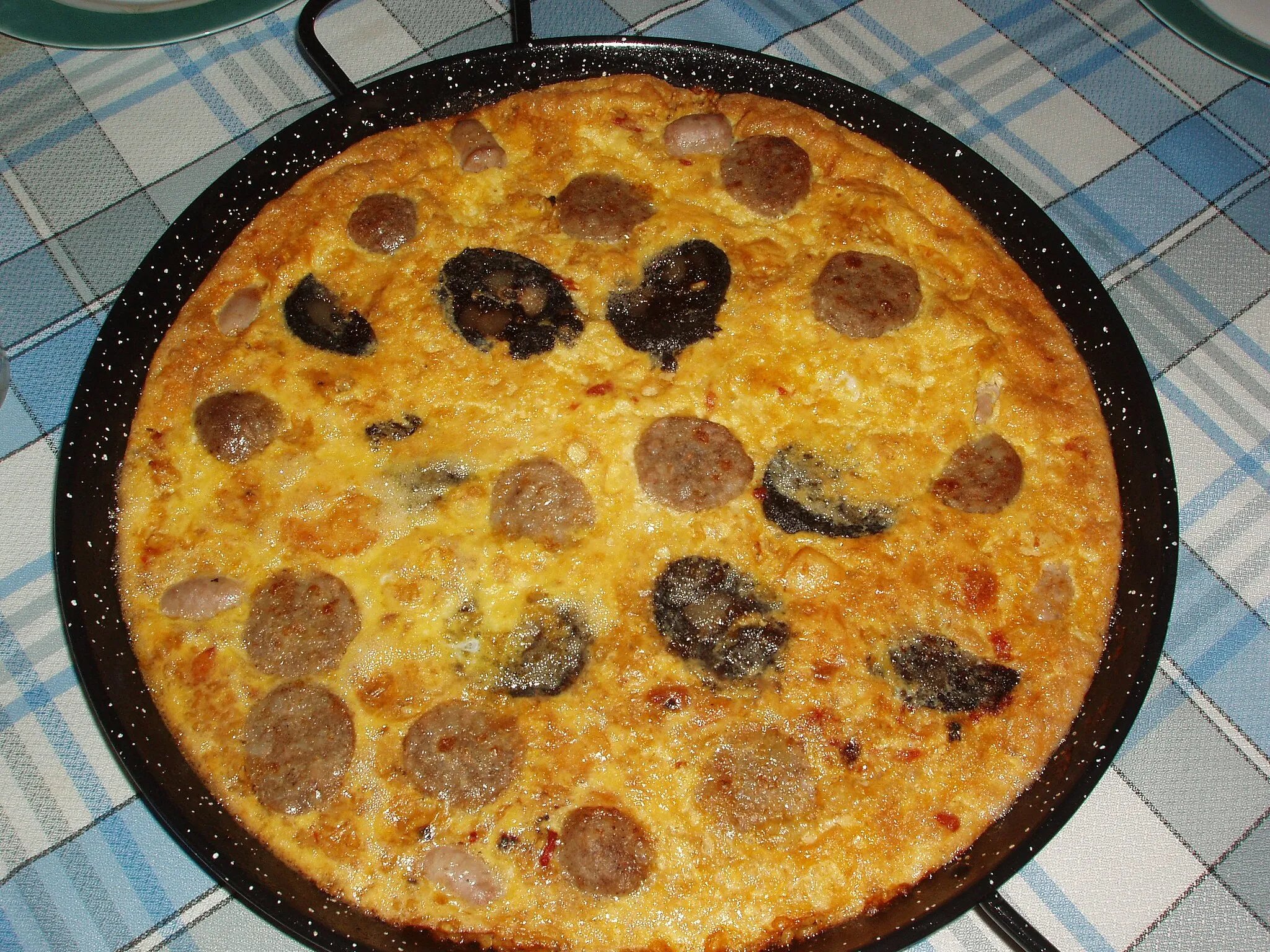 Photo showing: Arroz con costra or Arròs amb costra (Rice with crust). A typical Valencian plate made of rice wich is originated from the comarcas of Vega Baja and Baix Vinalopó, in the province of Alacant.