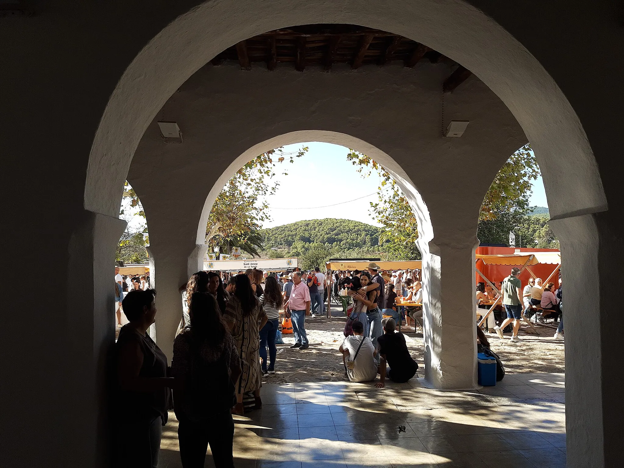 Photo showing: Leaving church to squid festival, Sant Carles de Peralta, Ibiza