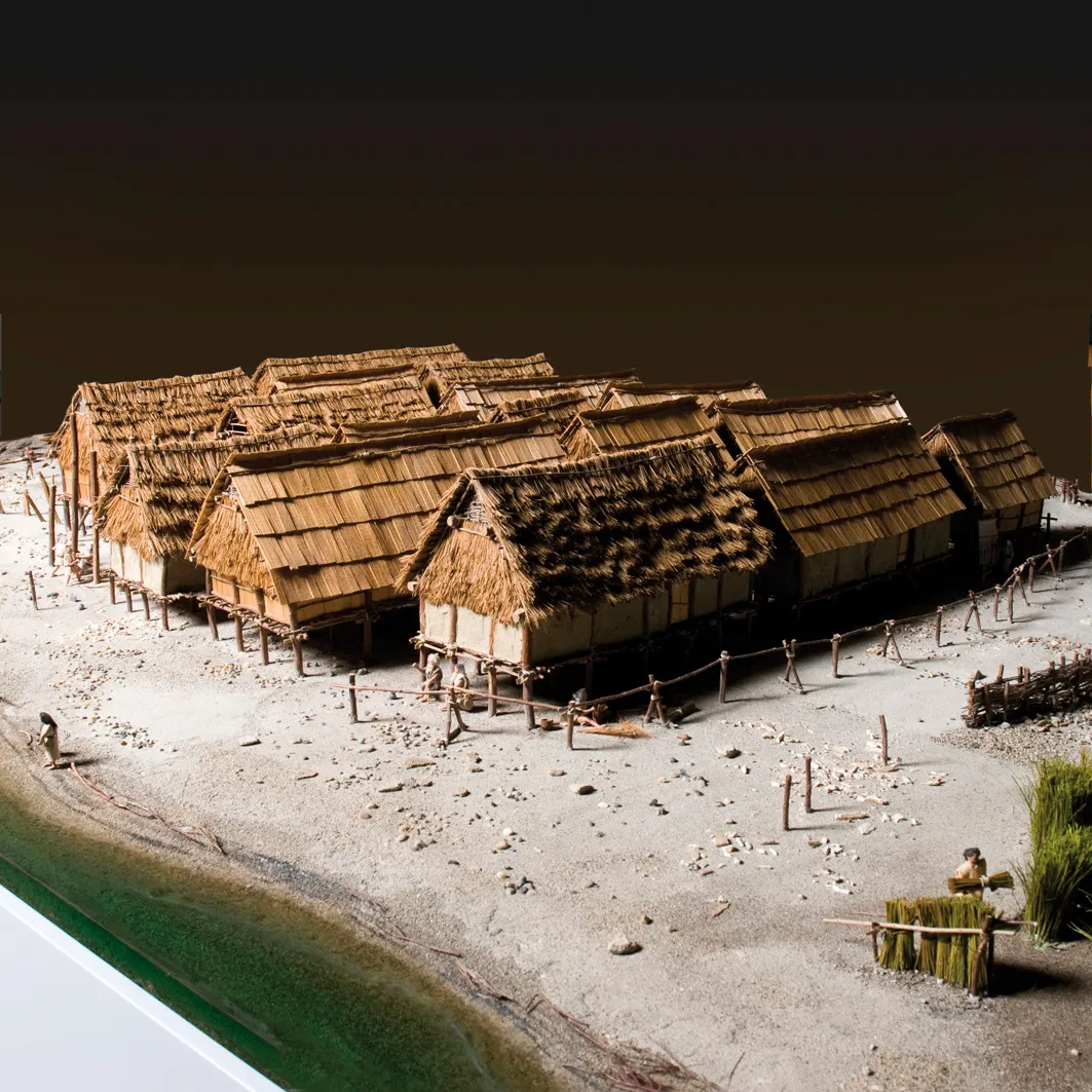 Photo showing: Scale model of the lacustrine village of Cortaillod-Est (Neuchâtel) at the time of its fundation (1000 B.C. ca). Picture by Y. André / Laténium.