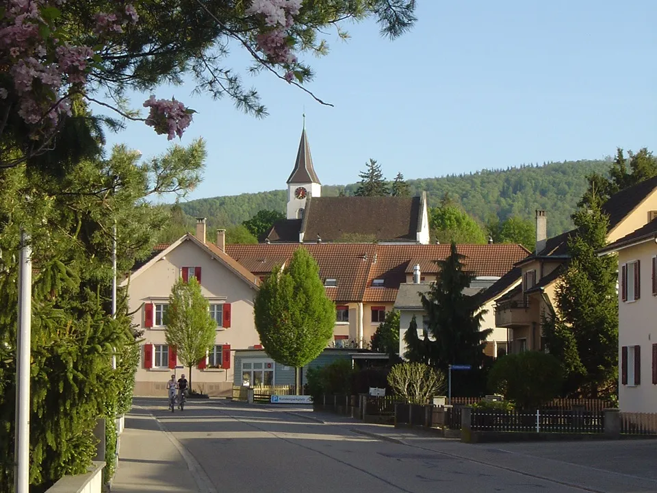 Photo showing: Railway Station Street in Möhlin. In the background the Old Catholic church