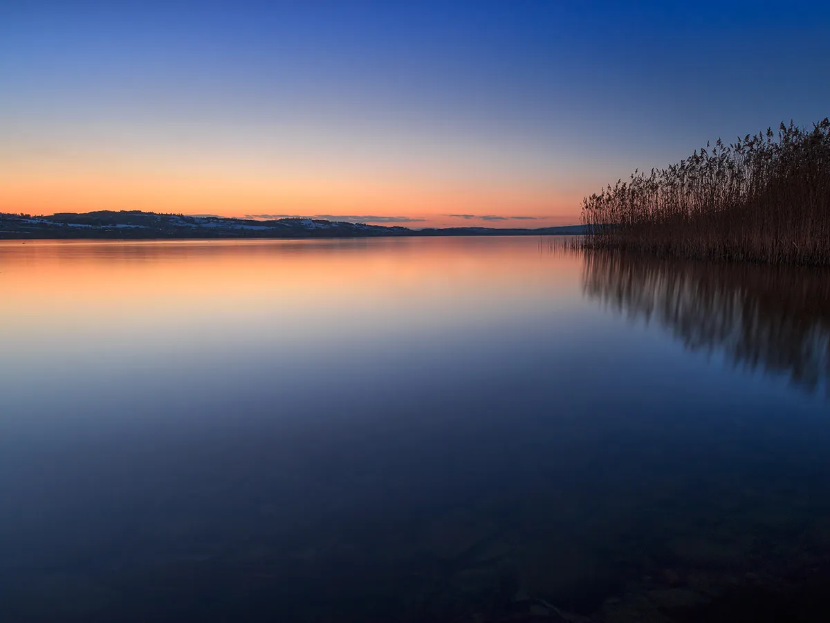 Photo showing: 500px provided description: eine Stimmung zum geniessen. Das sind solche Momente wo man einfach dasitzt und es in vollen z?gen geniesst. [#lake ,#sunset ,#switzerland ,#water]