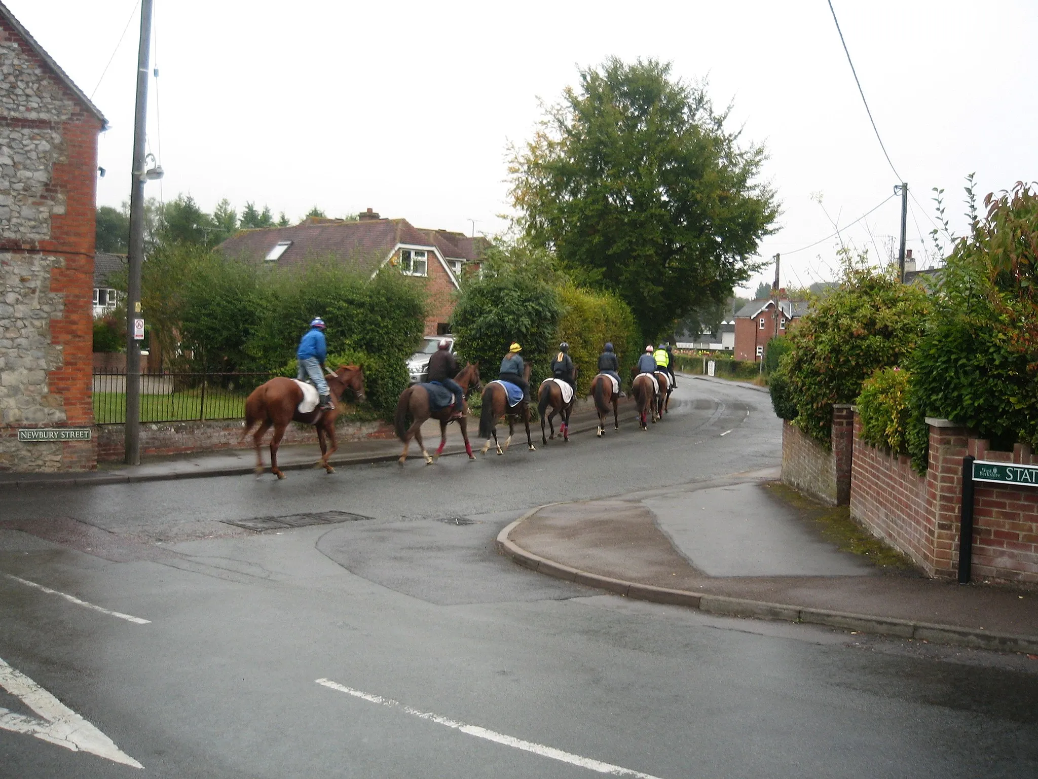 Photo showing: Jockeys taking horses to the gallops, Lambourn, Berkshire