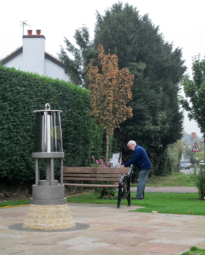 Photo showing: Gedling: tending the flowers at the miners' memorial