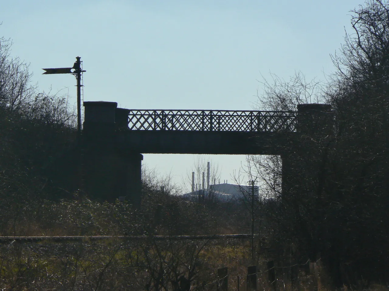Photo showing: Accommodation bridge Built across the Great Central Railway to connect the farmland on both sides, it is now disused. The lattice parapets are a feature of the GCR bridges.