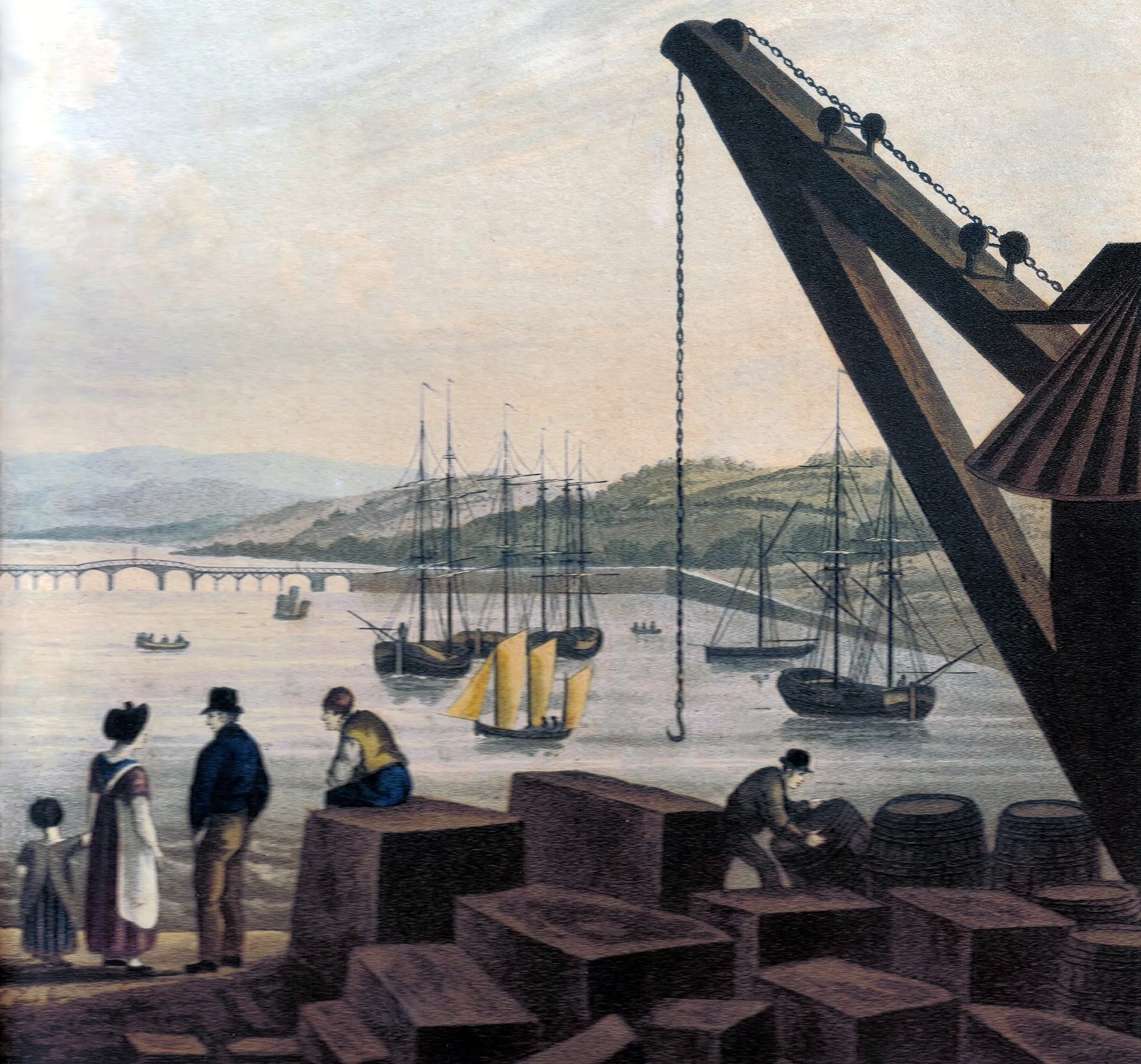 Photo showing: Teignmouth New Quay in 1827 showing blocks of cut Haytor granite awaiting transport. Shaldon bridge and the river Teign are in the background.