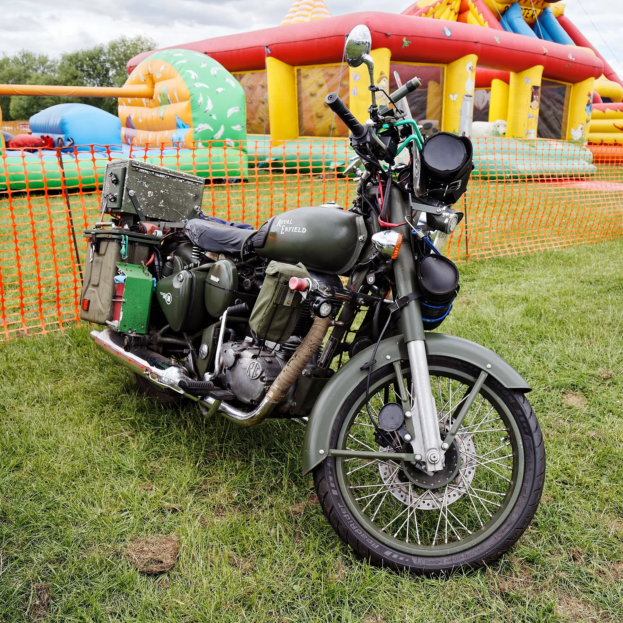 Photo showing: Royal Enfield motorcycle at Abridge Village Weekend 2022 in Abridge, Essex, England. Mobile device view (2022): Wikimedia makes it difficult to immediately view photo groups related to this image. To see its most relevant allied photos, click on Abridge, and this uploader's photos. You can add a beta click-through 'categories' button to the very bottom of photo-pages you view by going to settings... three-bar icon top left. Desktop view (2022): Wikimedia makes it difficult to immediately view the helpful category links where you can find images related to this one in a variety of ways; for these go to the very bottom of the page. Camera: Canon EOS 6D Mark II with Canon EF 24-105mm F4L IS USM lens. Software: RAW file lens-corrected, optimized and converted with DxO PhotoLab 4 Elite, and further optimized with Adobe Photoshop CS2.