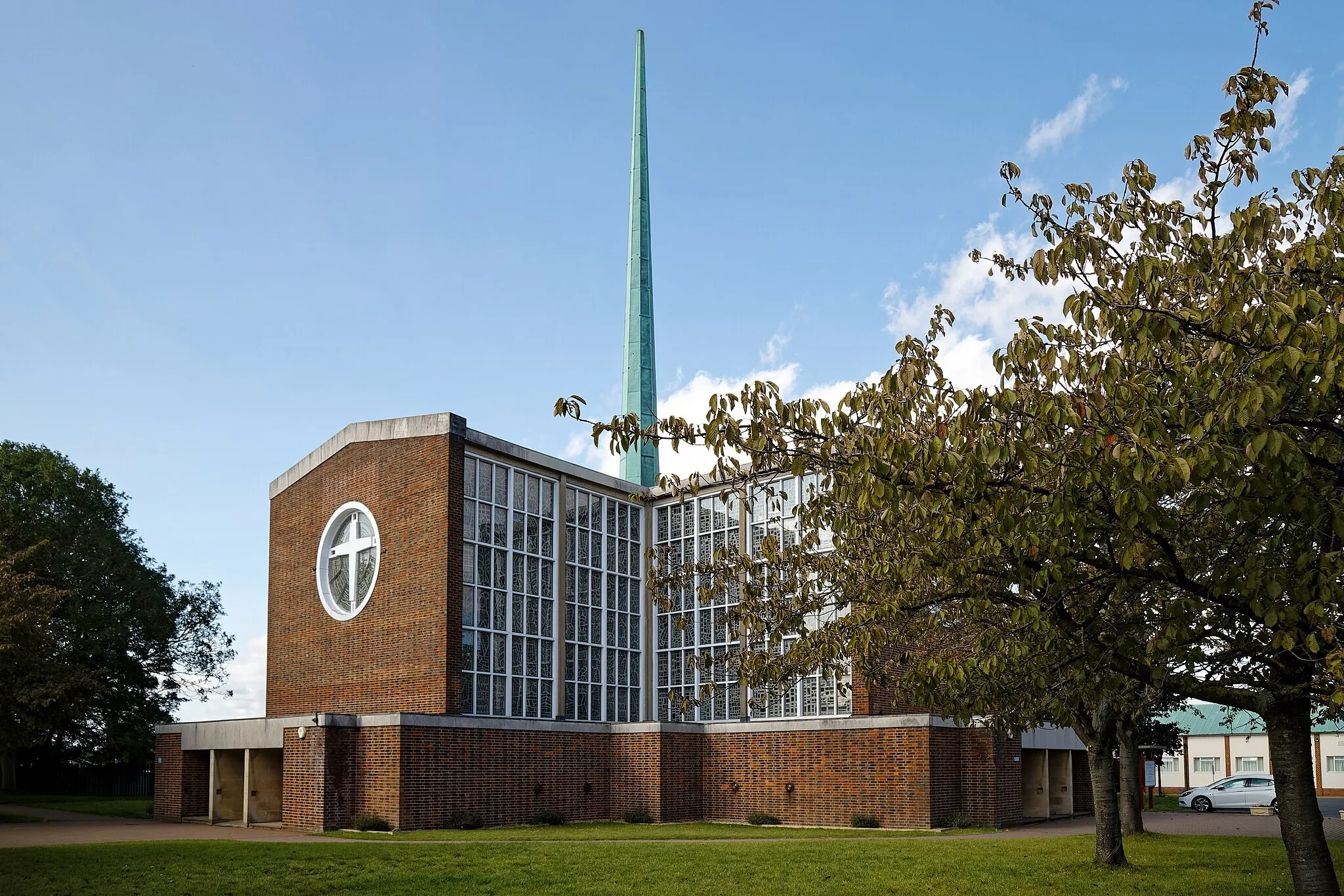 Photo showing: Our Lady of Fatima Roman Catholic Church in Harlow, Essex, England. Wikimedia (2023) makes it difficult to view photos related to this image, so to see its most relevant allied group, click on Our Lady of Fatima, Harlow, this uploader's Church photos, or the helpful categories at the bottom of this page for a variety of images relevant to this one. This image is one of a series of date and/or subject allied consecutive photographs kept in progression or location by file name, number and/or time marking. Camera: Canon EOS 6D Mark II Software: file lens-corrected and optimized with DxO PhotoLab 6 Elite.