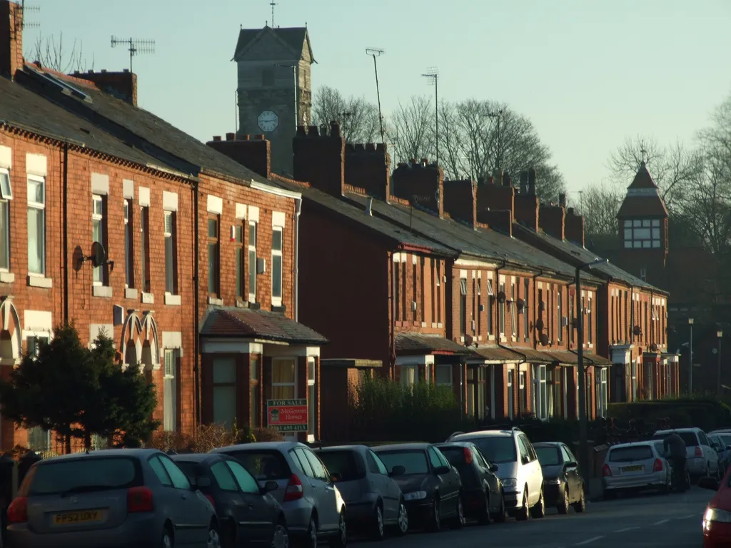 Photo showing: Durnford Street in Middleton, Greater Manchester, England. The Parish church of St Leonard appears over the rooftops