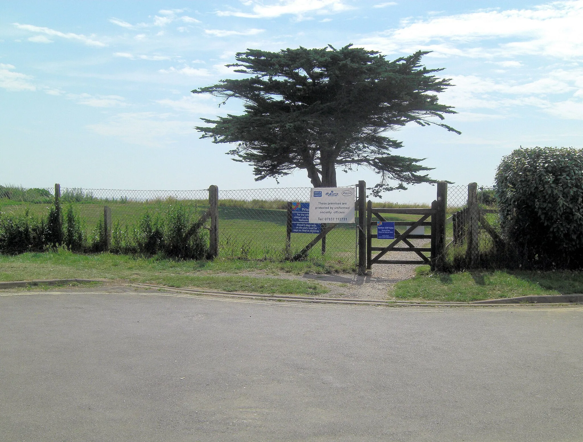 Photo showing: Barton Cliff gate to Naish Holiday Park