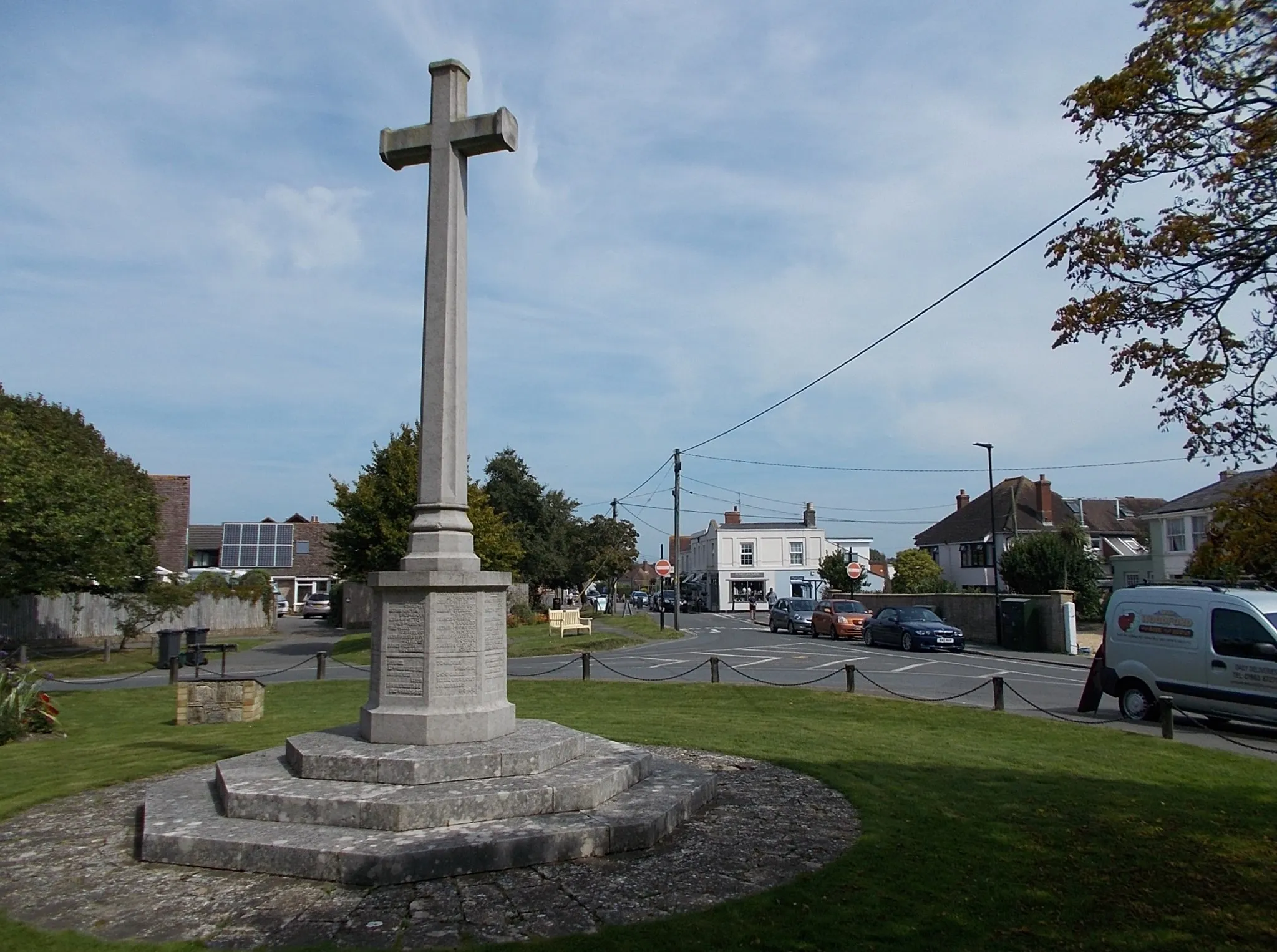 Photo showing: Village centre, Bembridge, Isle of Wight, UK, with the war memorial in the foreground