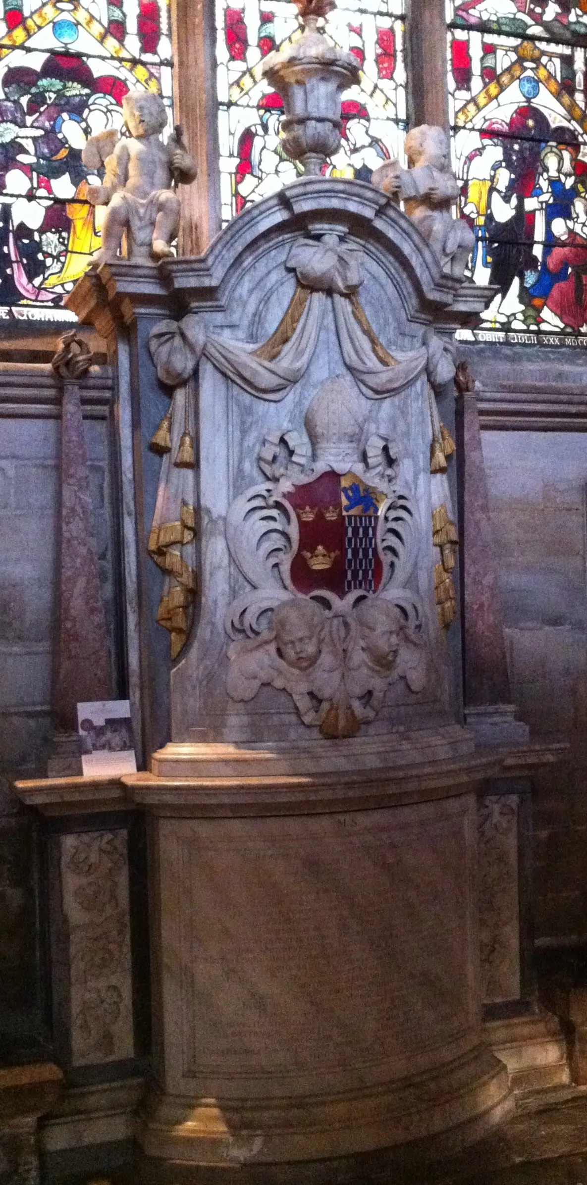 Photo showing: Memorial to Bishop Simon Patrick in Ely Cathedral. Arms appear as Vair, on a chief or a lion passant azure