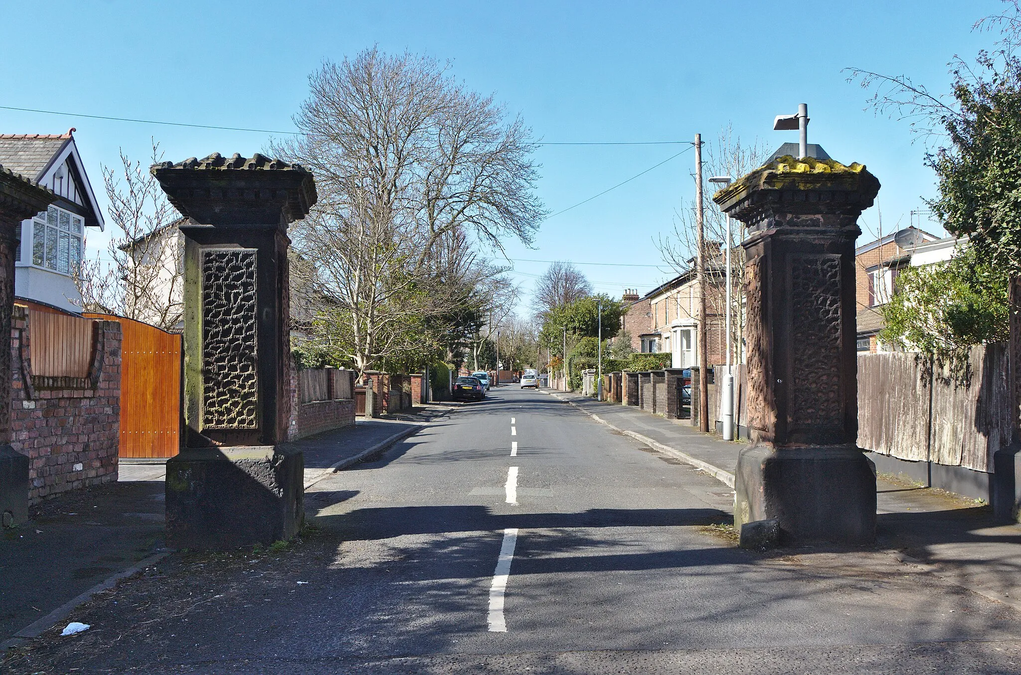 Photo showing: Pair of rusticated stone gate piers at the entrance to Litherland Park opposite School Lane.