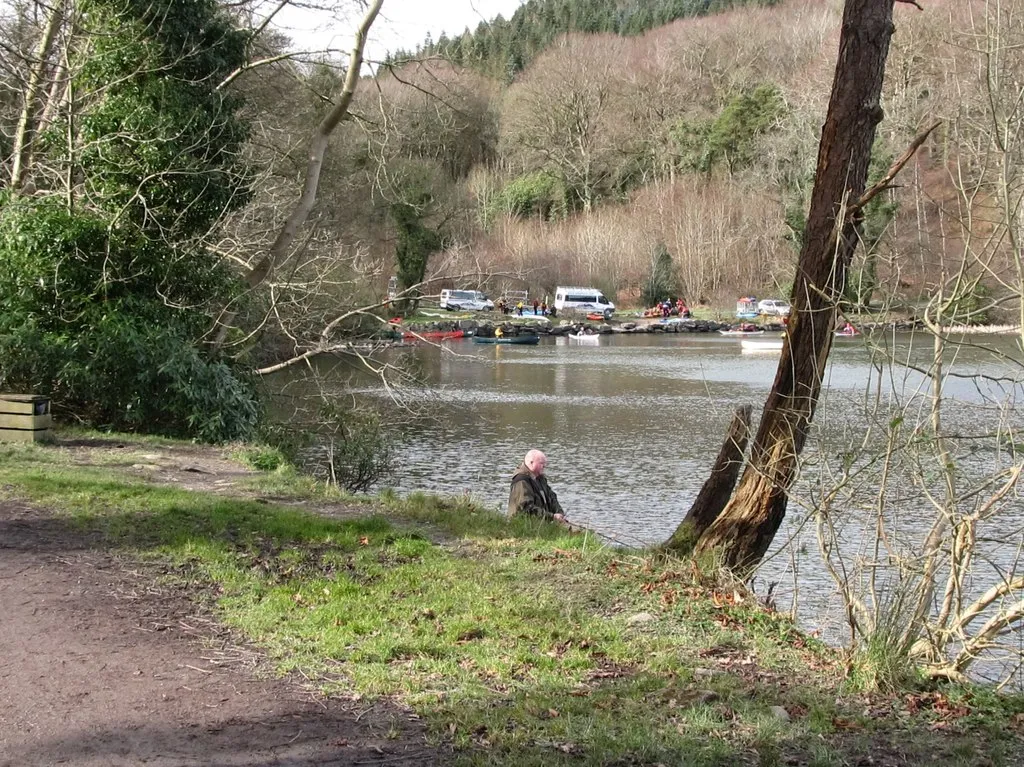 Photo showing: A fisherman and canoeists at the western end of Castlewellan Lake