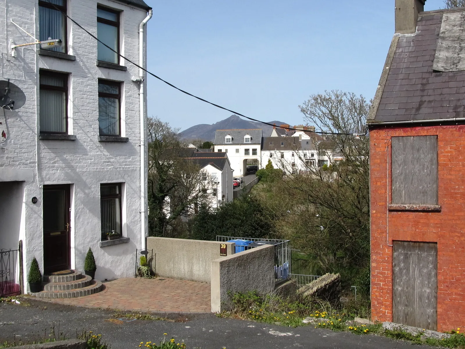 Photo showing: Housing on both sides of the Aughrim River