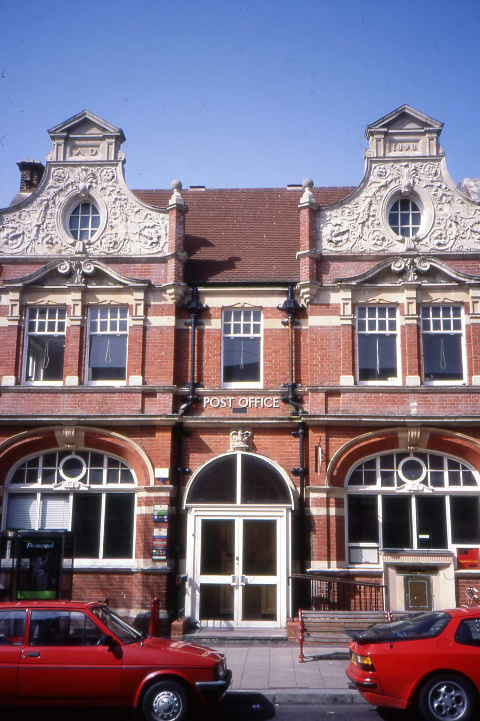 Photo showing: Still owned by the Post Office, but after the counter facility had moved into Martins, the former Sainsbury Store at 2-3 VIctoria Road. The brass letter box was still in use at the time of the photograph.