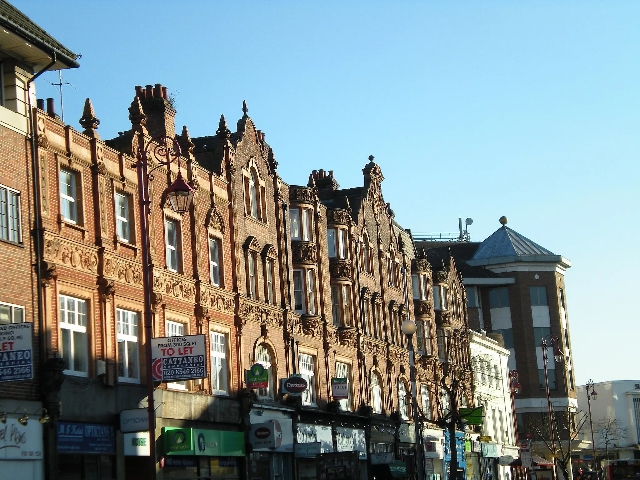 Photo showing: A street in Surbiton, near the station.