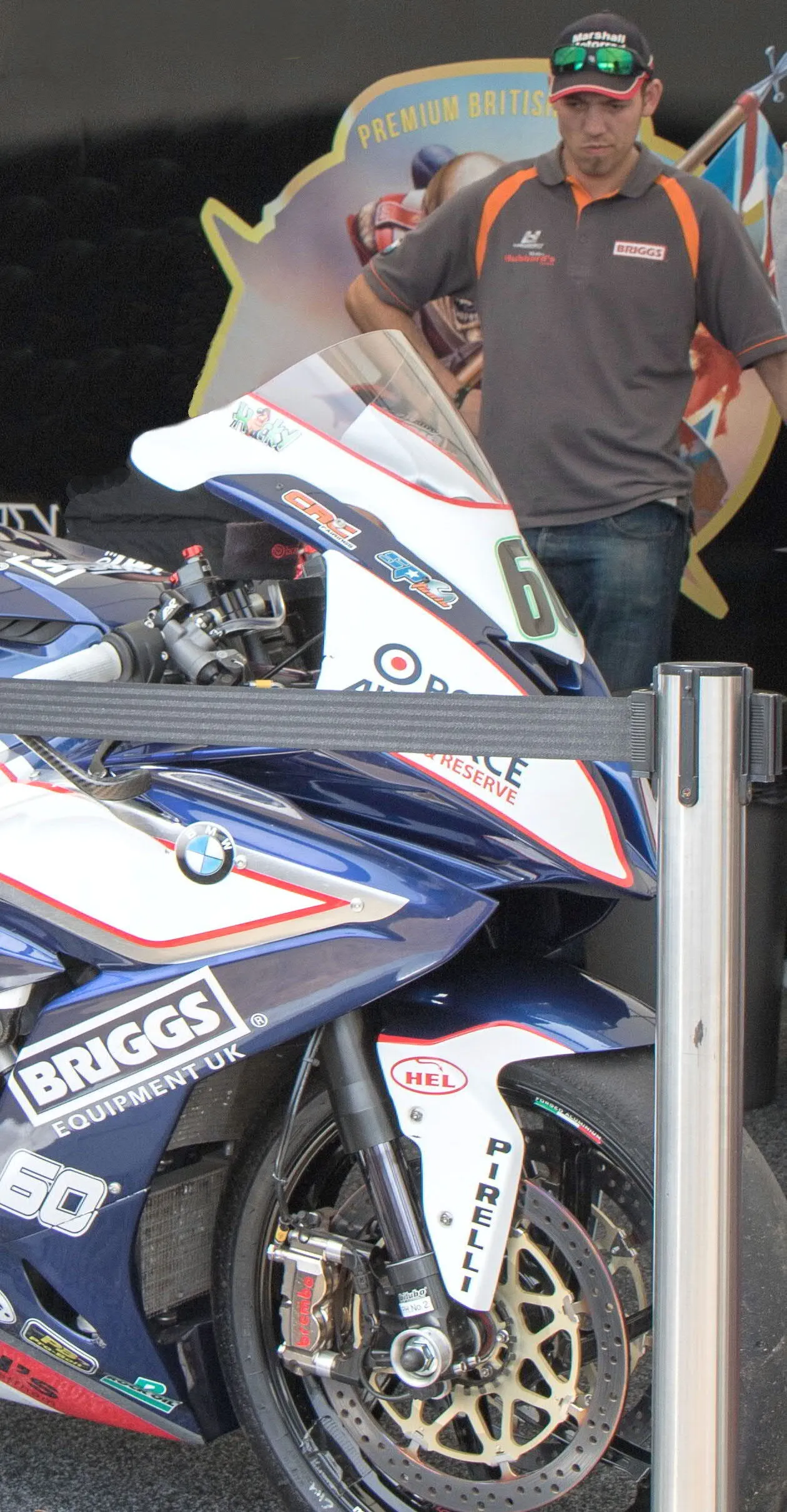 Photo showing: English motorcycle road-racer Peter Hickman with the British Superbike specification BMW S1000RR sponsored by Briggs Equipment and RAF Reserves at 2015 Isle of Man TT races