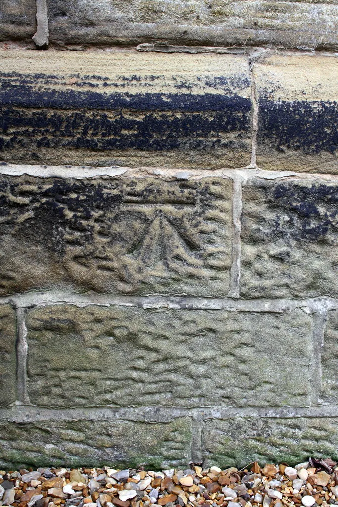 Photo showing: Benchmark on west face of St John's Church