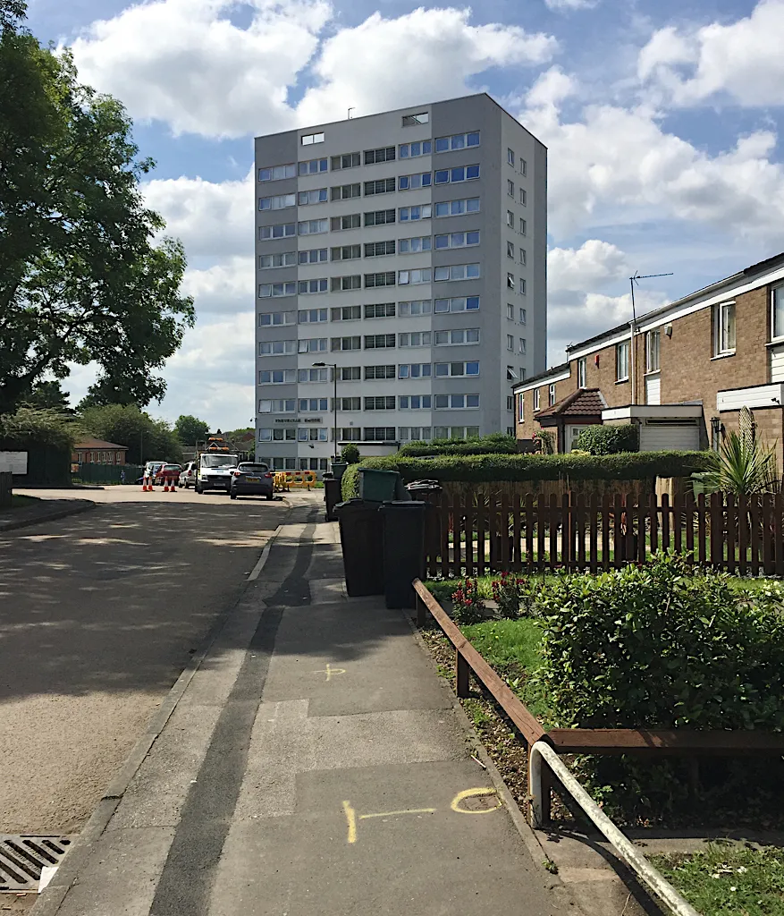 Photo showing: A typical tower block and houses in Chelmsley Wood