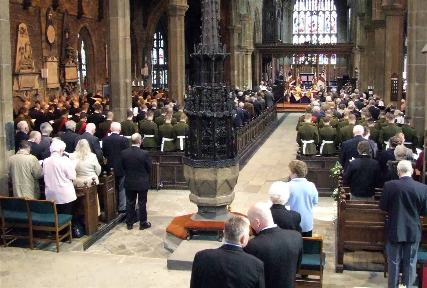 Photo showing: Laying up of 1981 stand of Regimental Colours of the 1st Battalion Duke of Wellingtons Regiment in the Parish Church, Halifax, West Yorkshire, UK