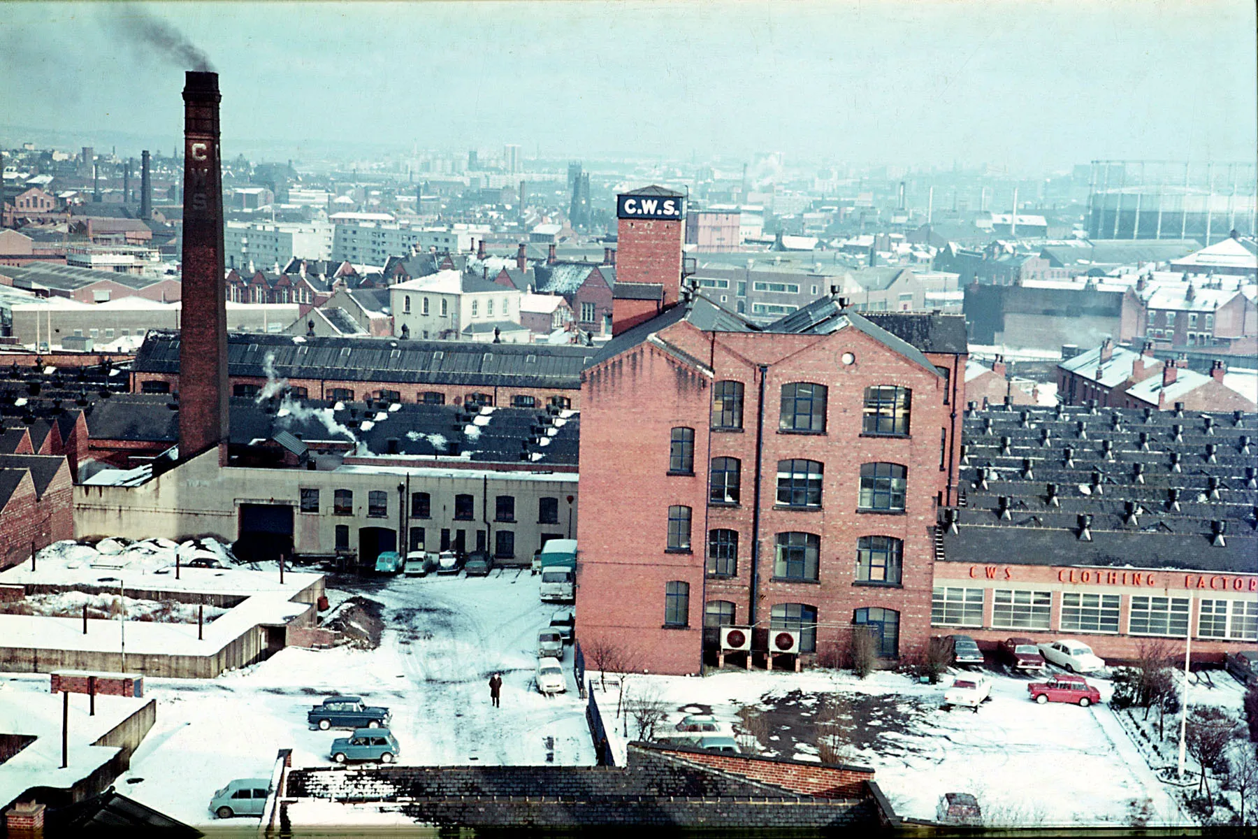 Photo showing: Take 2 of an earlier scan. The CWS Menswear Clothing Factory at The Mint, Holbeck, Leeds as it was around 1966. Taken from the new flats and showing some of the Leeds skyline in the background.