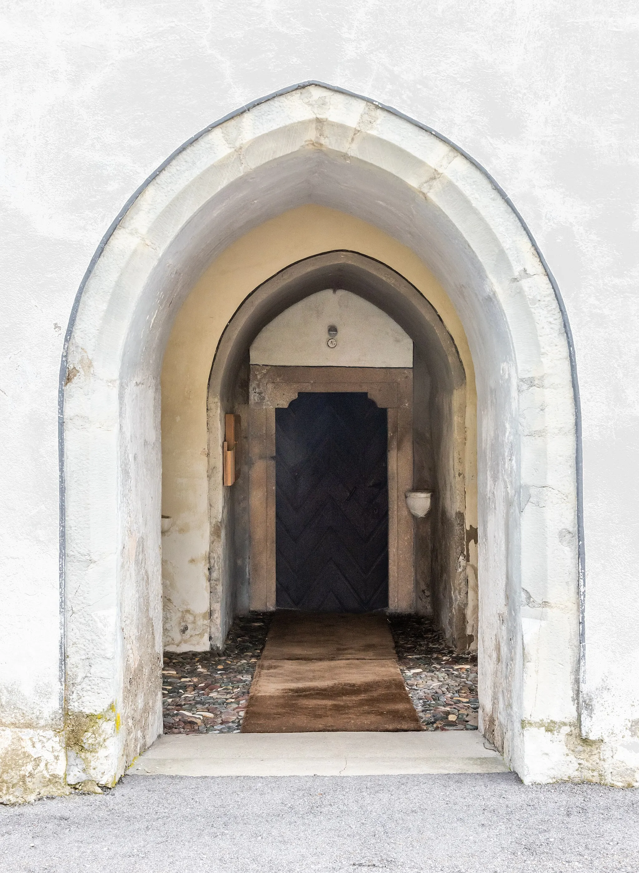 Photo showing: Western portal of the parish church Saint George in Feistritz an der Drau, market town Paternion, district Villach Land, Carinthia, Austria, EU