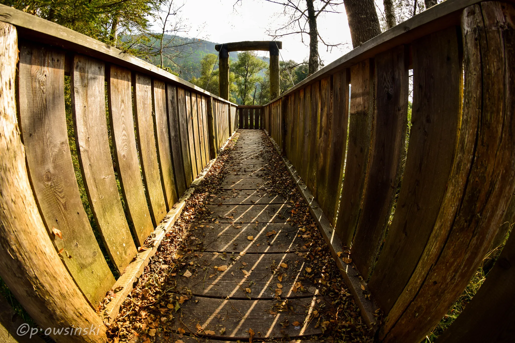 Photo showing: 500px provided description: Wooden Bridge Over A River [#Autumn ,#Bridge ,#River]